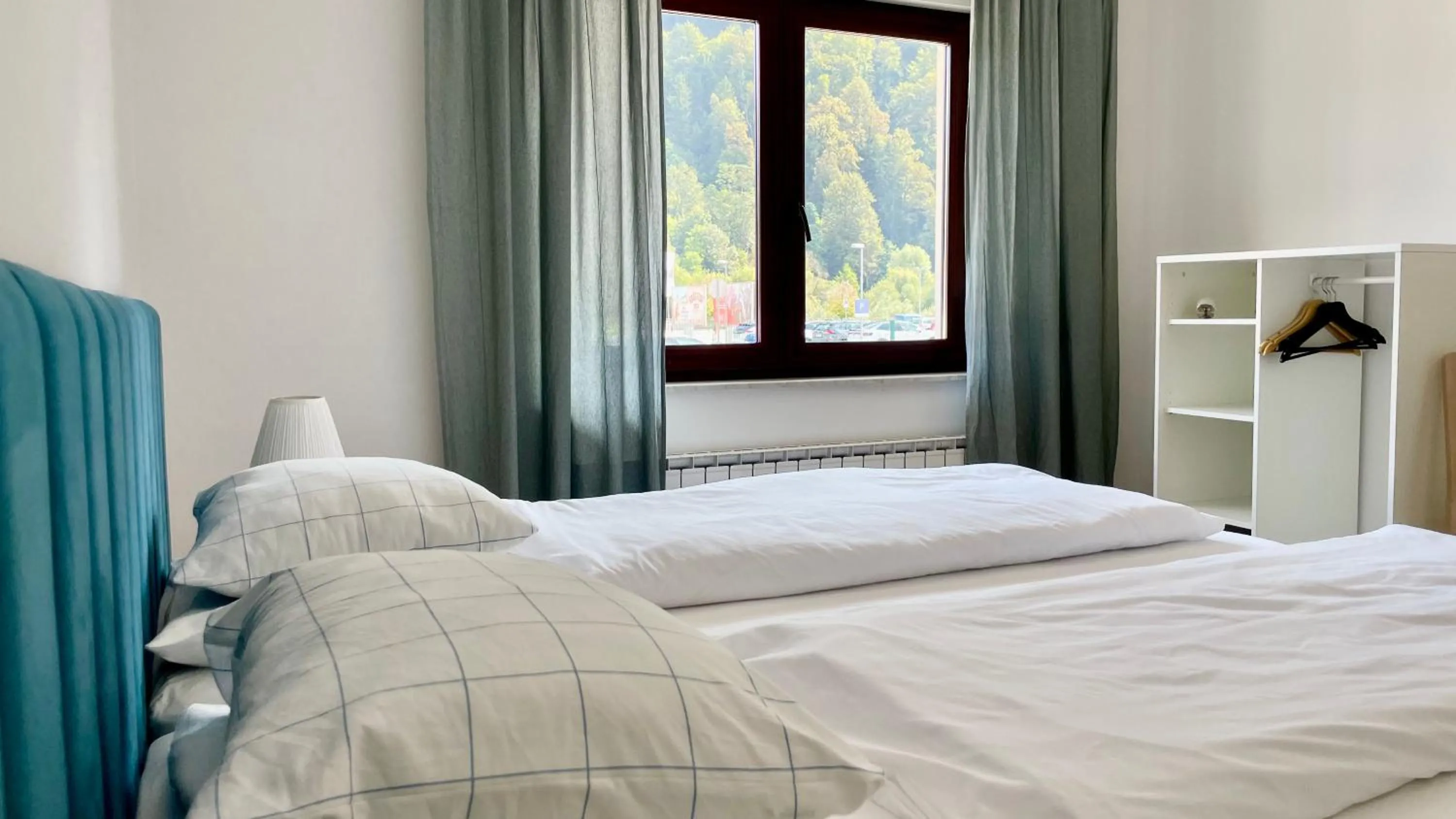 Bed in All Seasons Apartments Laško