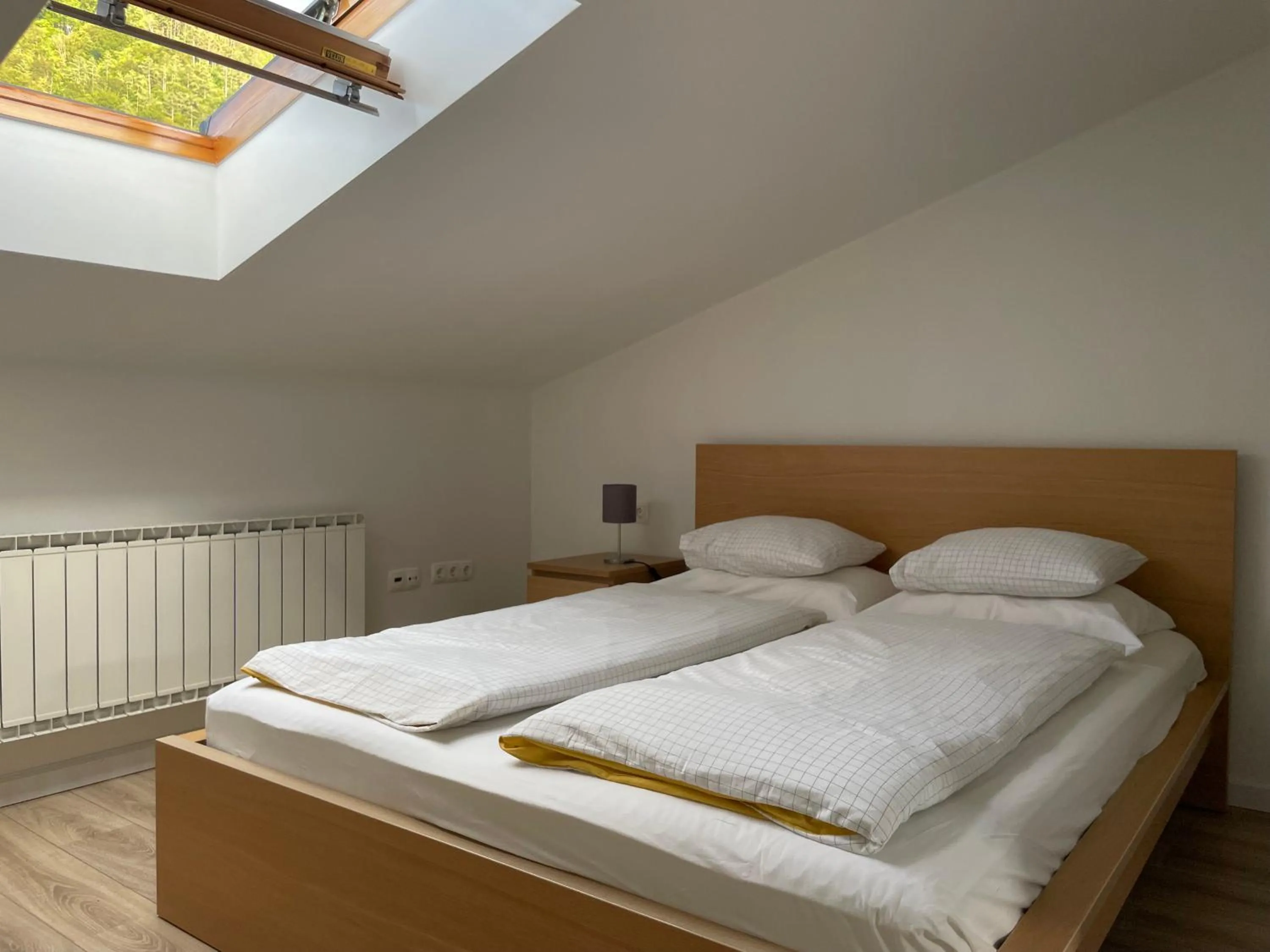 Bed in All Seasons Apartments Laško