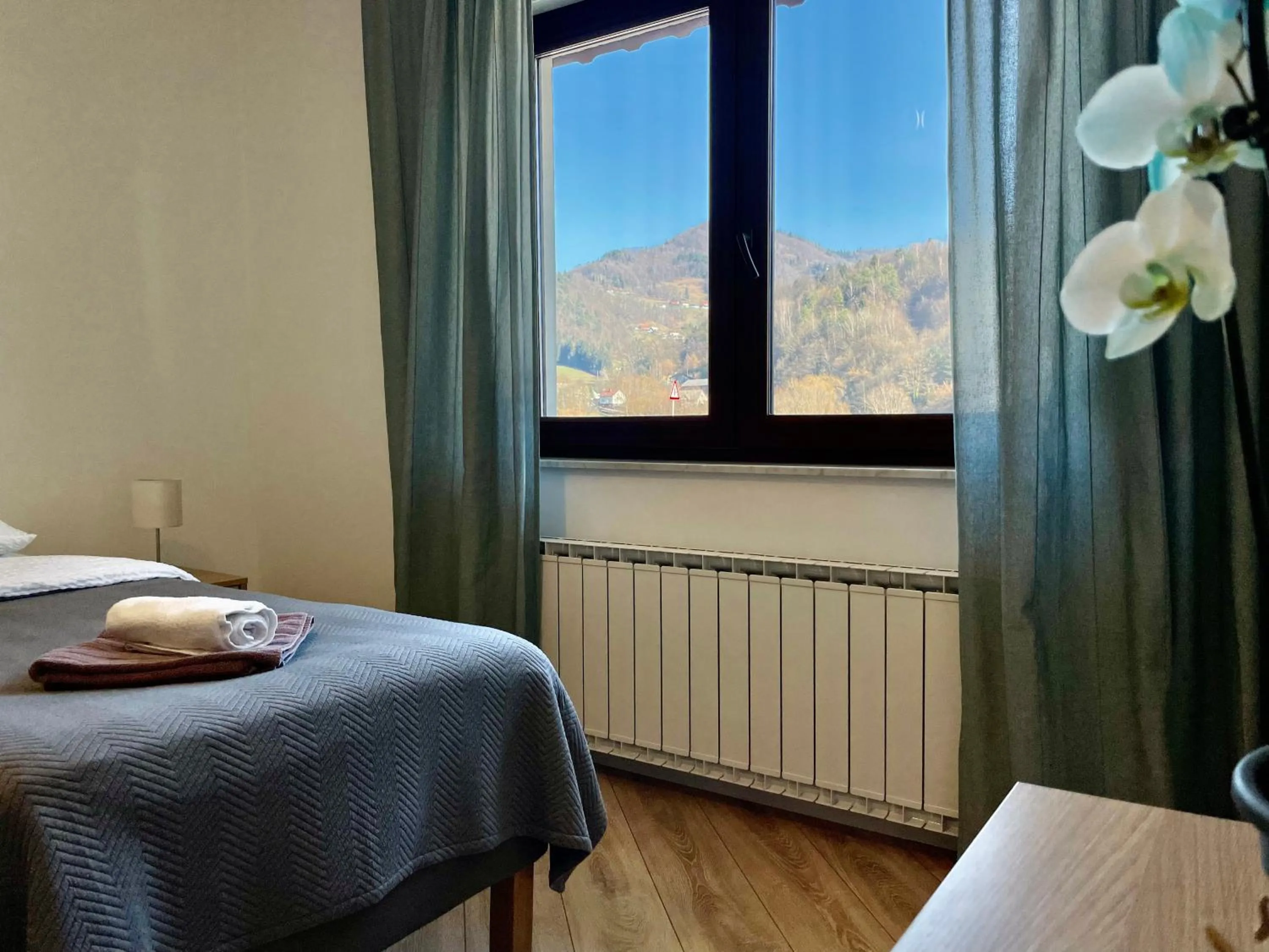 Bed in All Seasons Apartments Laško