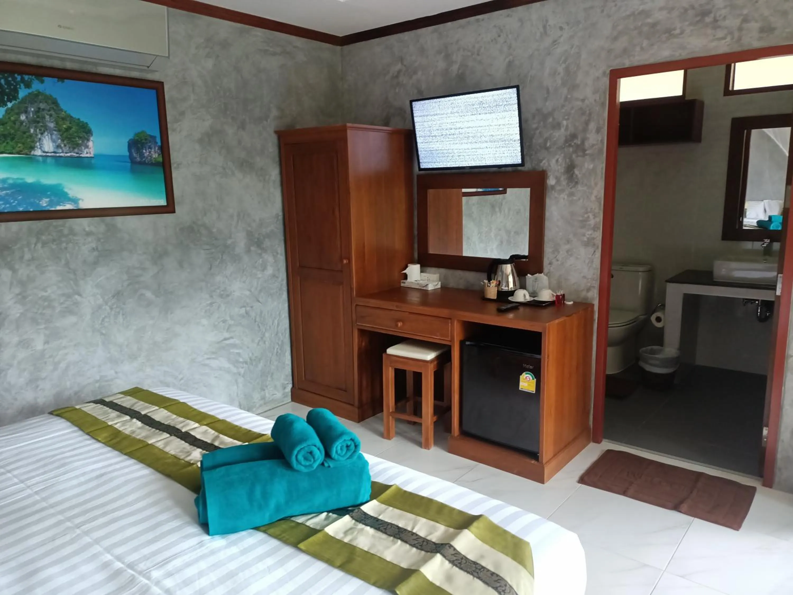 Photo of the whole room, Bed in The mantra resort