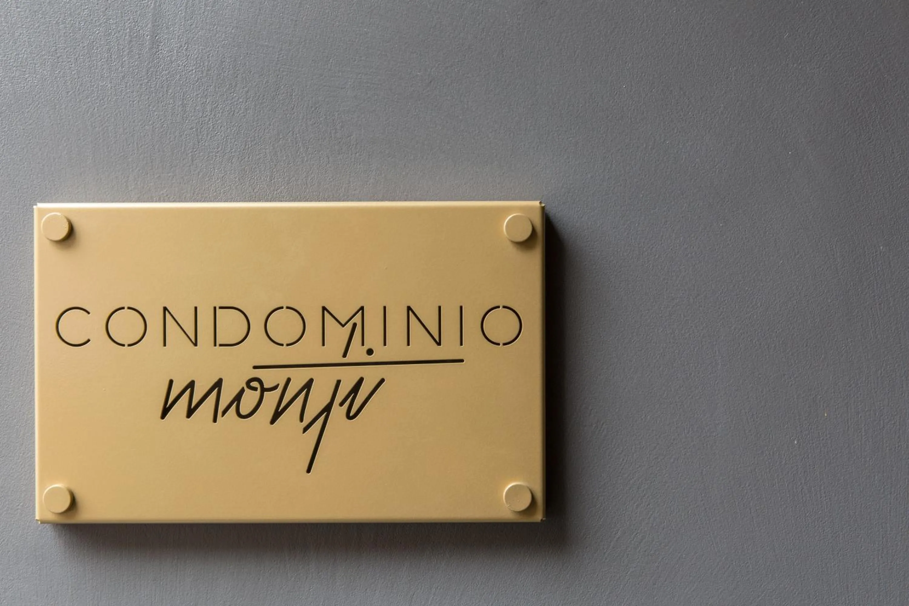 Property logo or sign in Condominio Monti Boutique Hotel