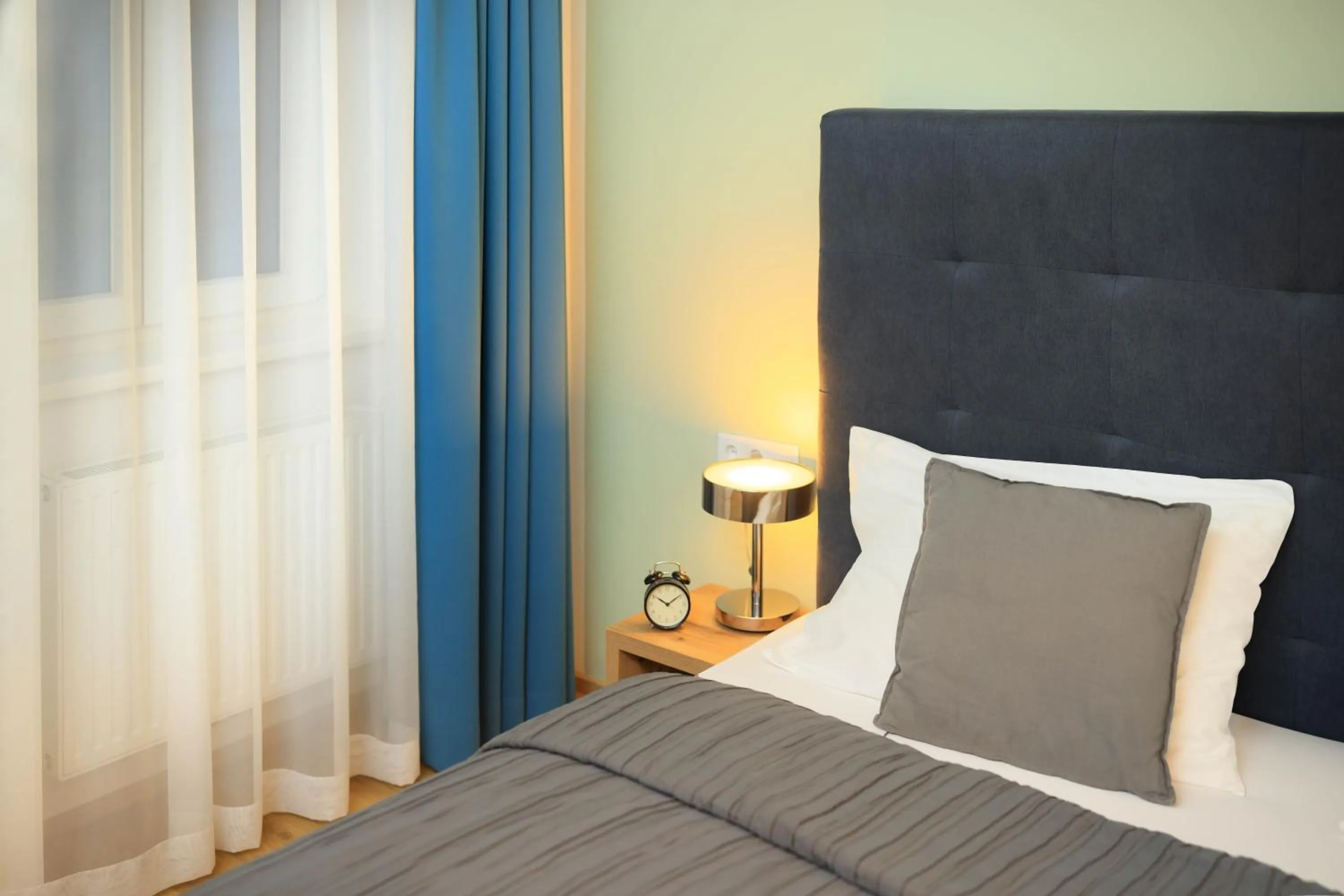 Bed in Jimmy's Apartments Dandelion