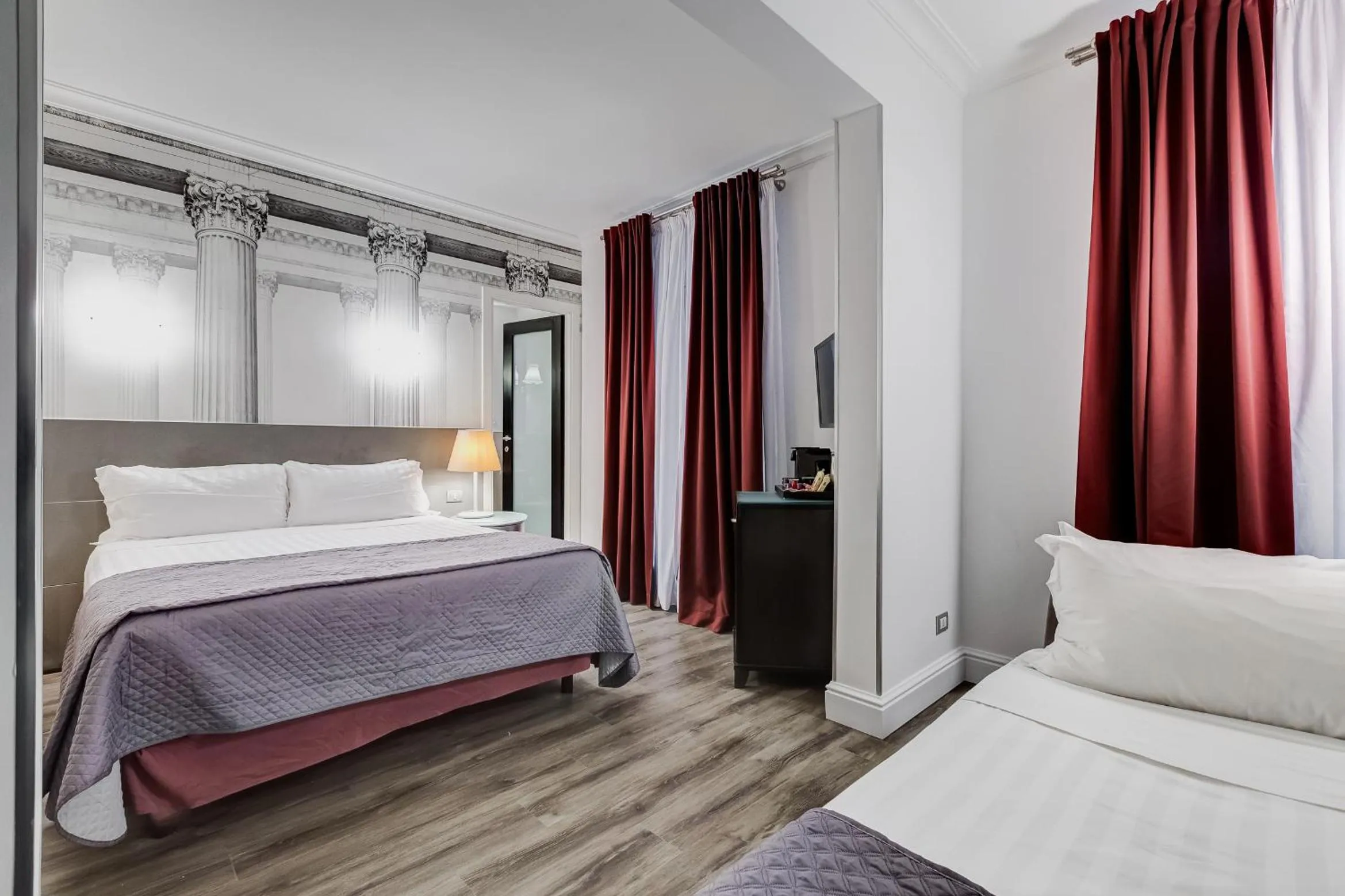 Bed in Residenza A -Via Veneto Fashion Rooms -self check-in