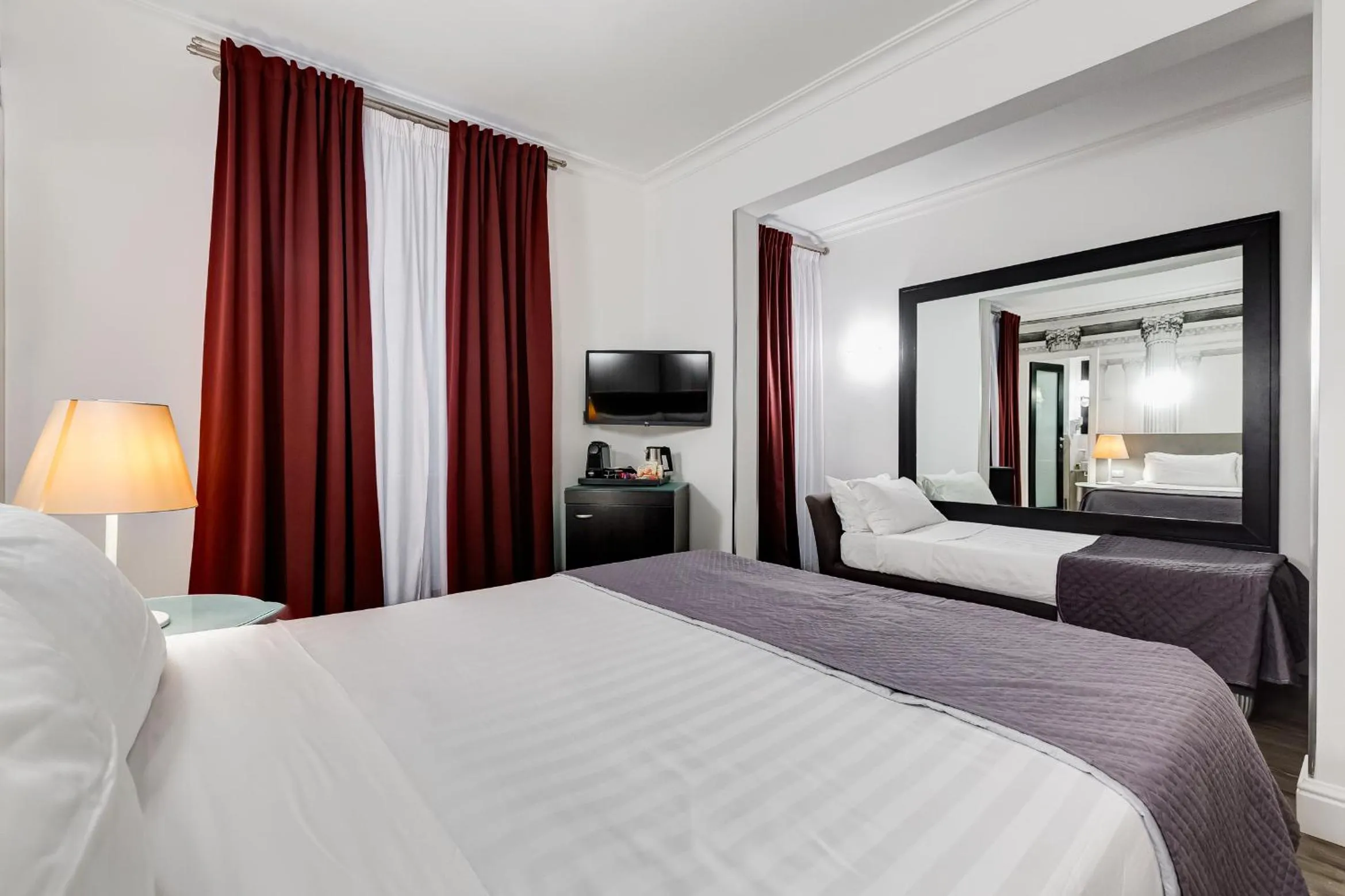 Bed in Residenza A -Via Veneto Fashion Rooms -self check-in