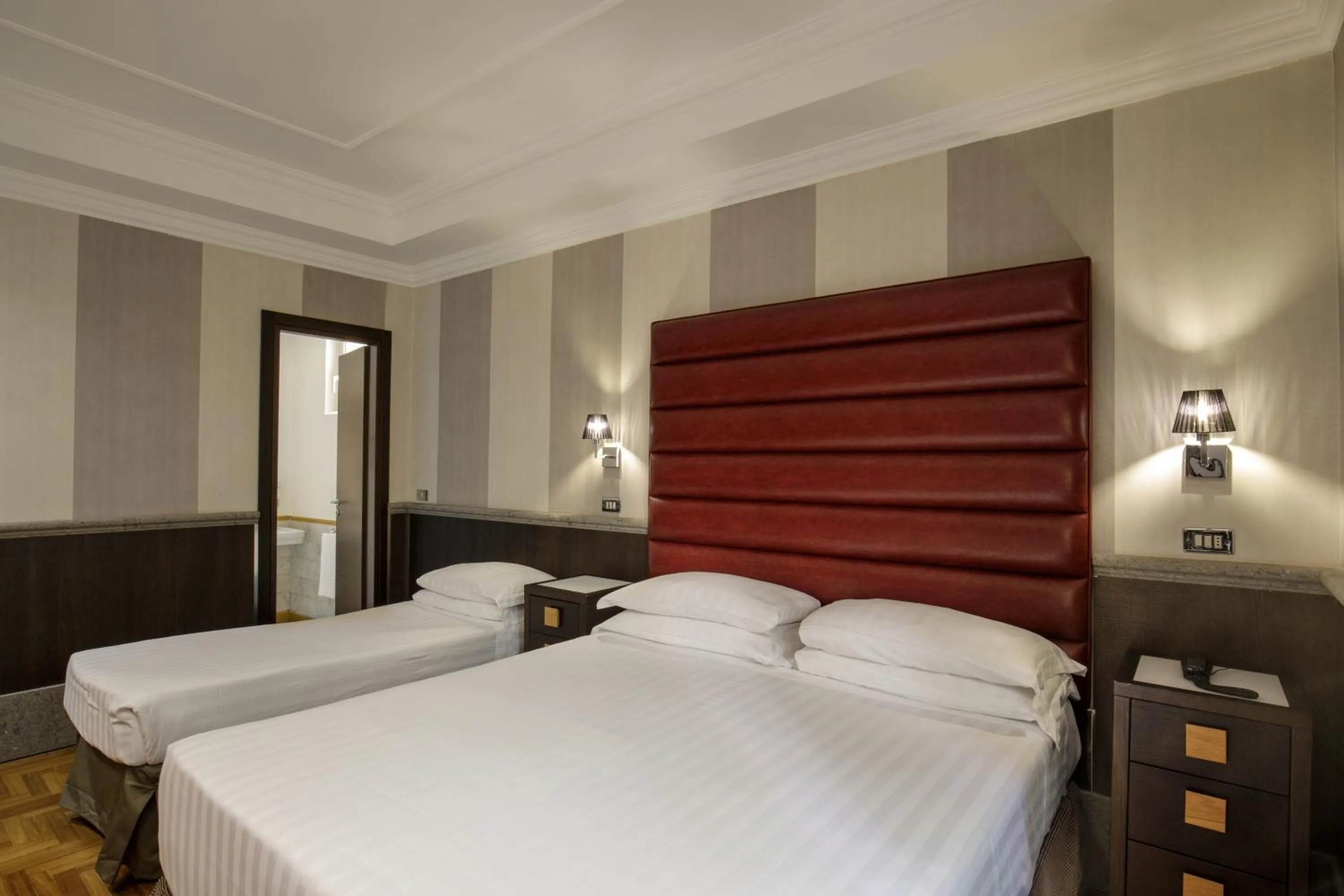 Bed in Hotel Royal Court