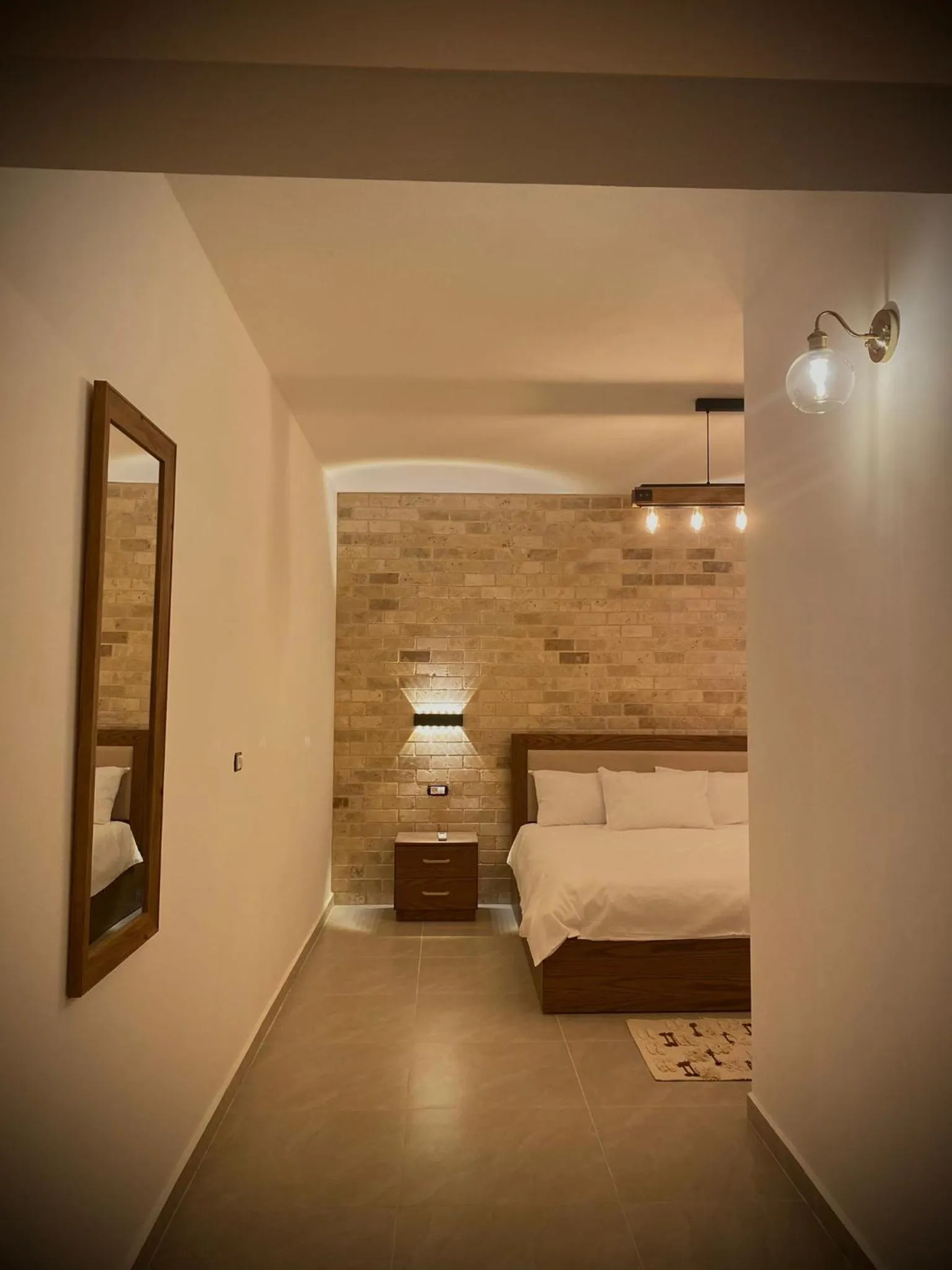 Living room, Bed in Ran suites