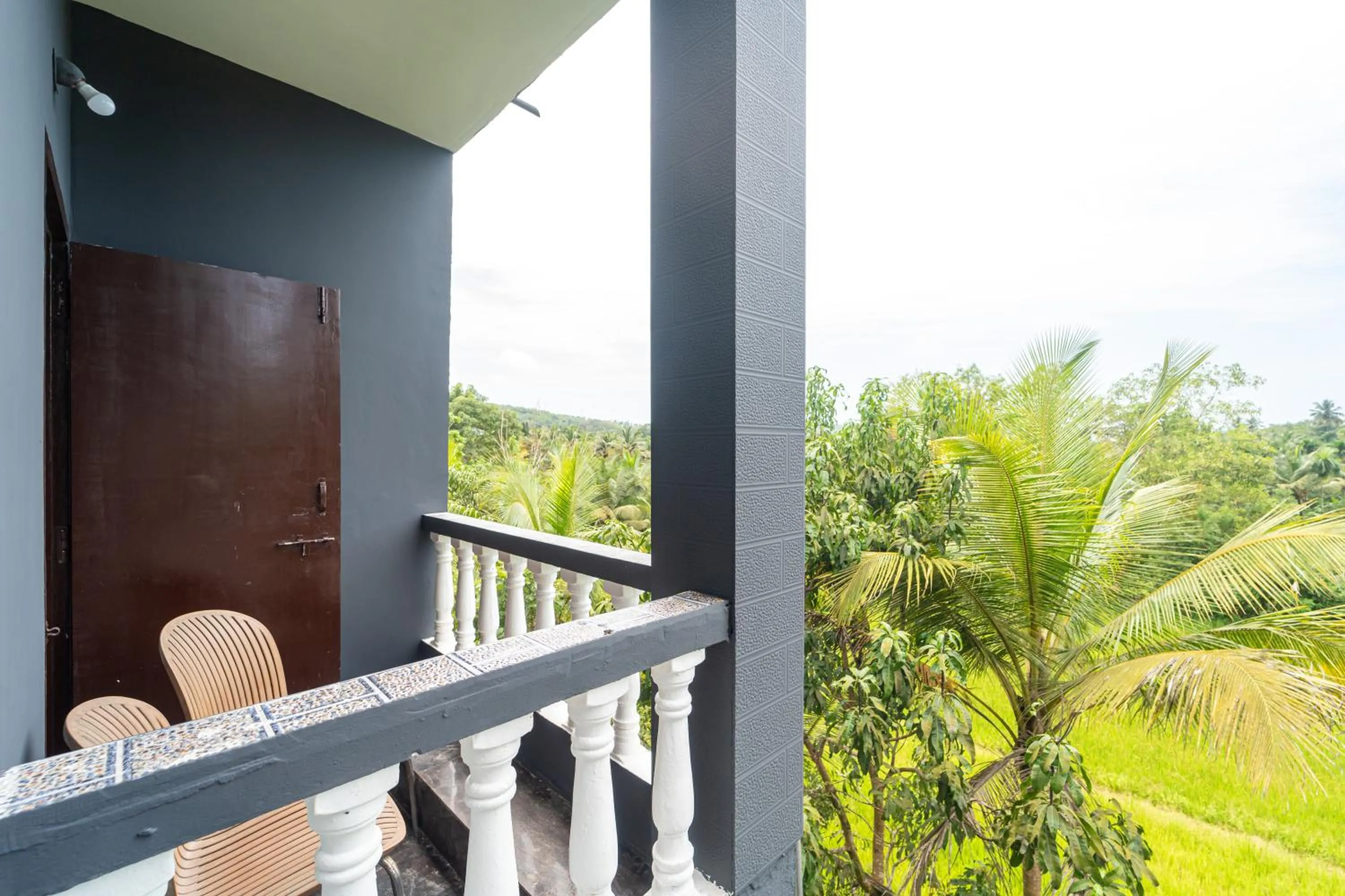 Balcony/Terrace in Treebo Clarissa Resort with Swimming Pool