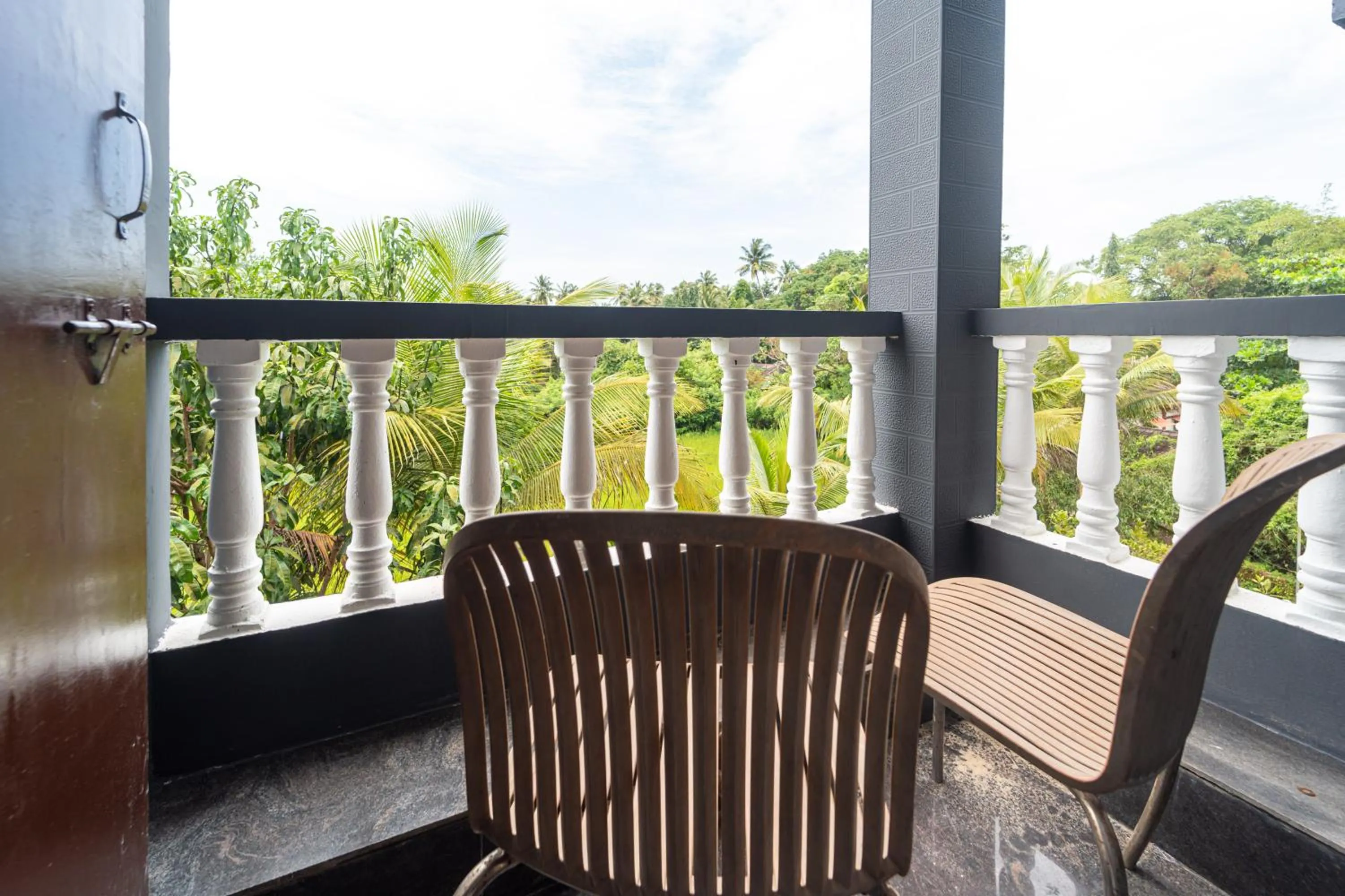 Balcony/Terrace in Treebo Clarissa Resort with Swimming Pool