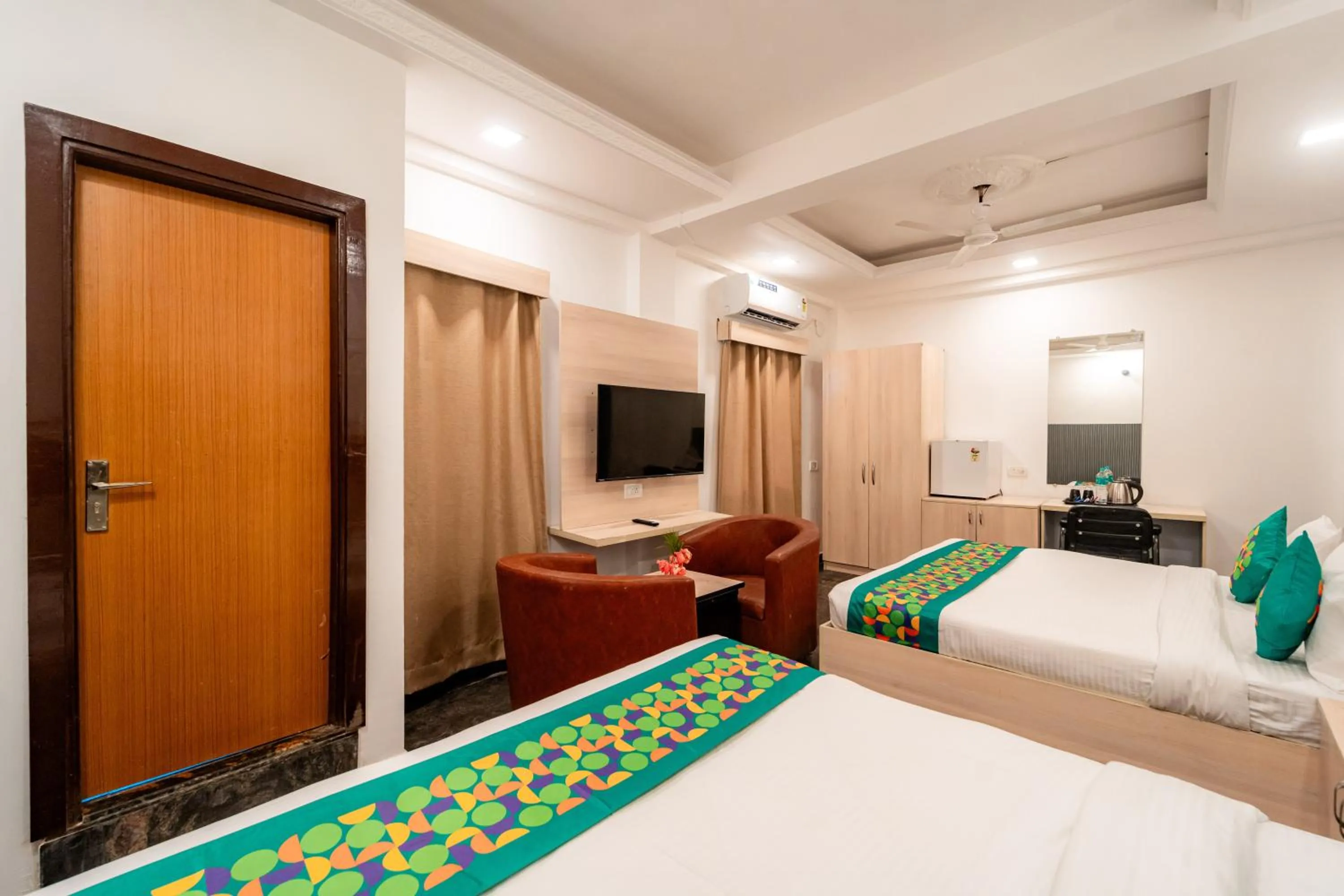 Bedroom, Bed in Treebo Clarissa Resort with Swimming Pool