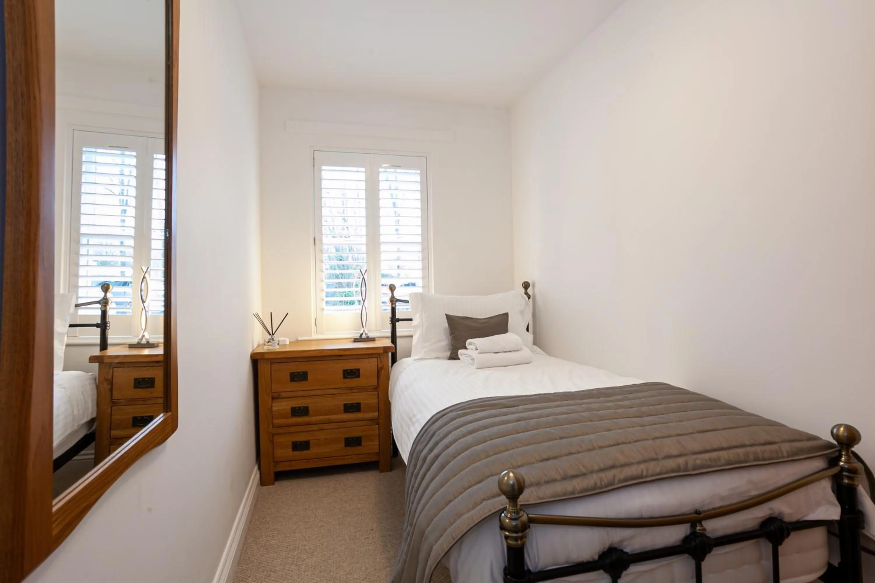 Bedroom, Bed in Keswick Ground floor apartment with parking