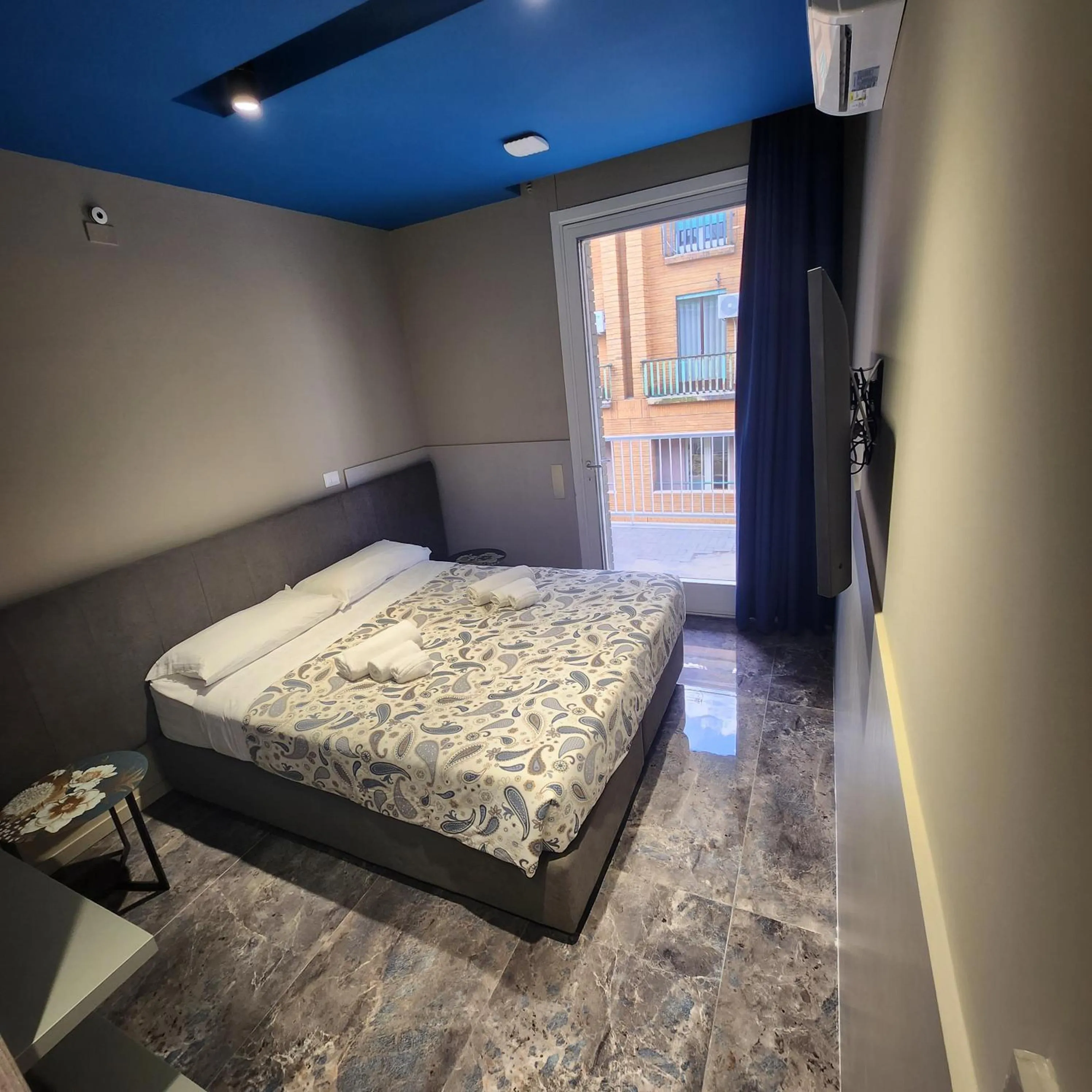 Bed in Mia Suites Hotel Bella Capri