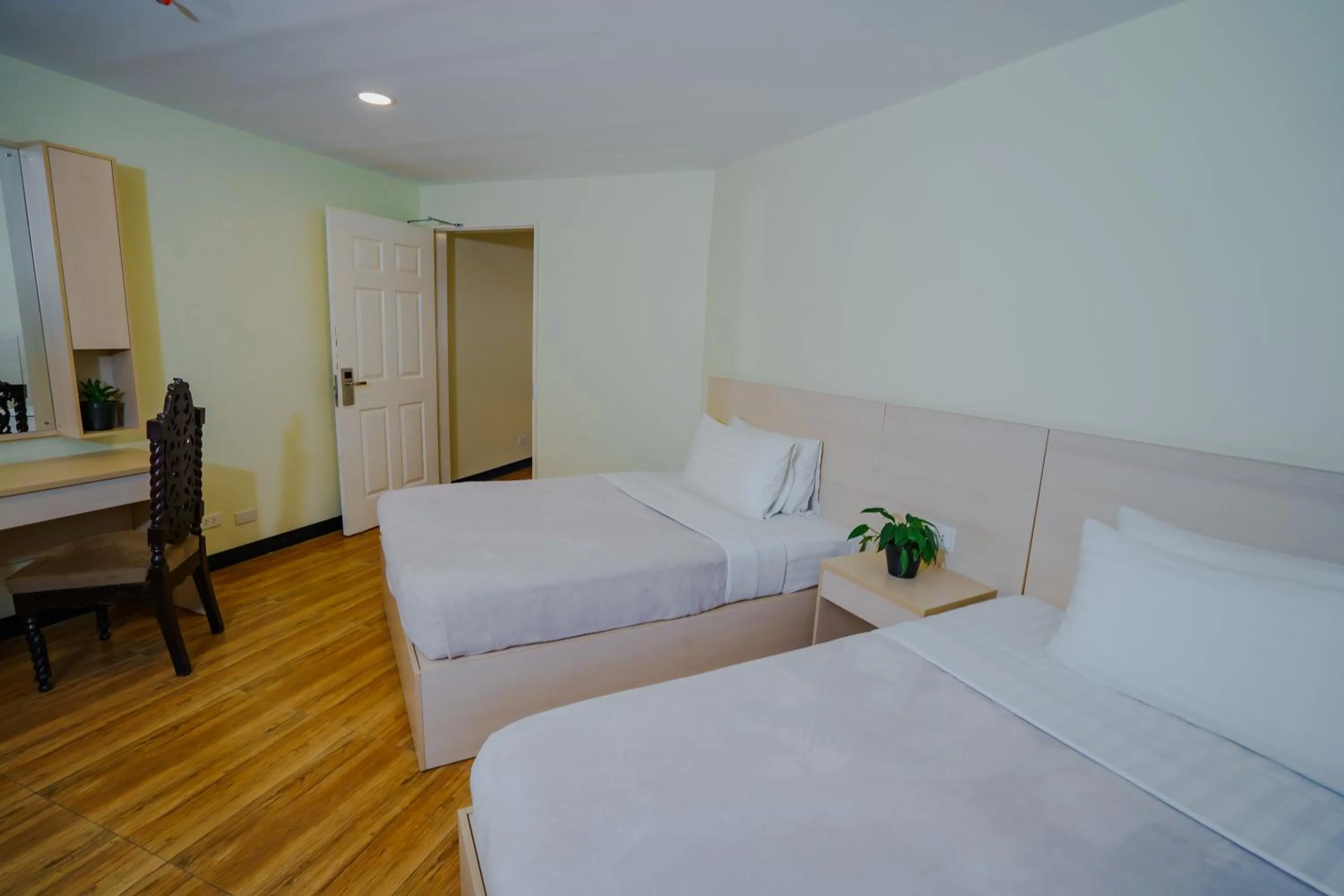 Bedroom, Bed in Olive Town Center and Hotel