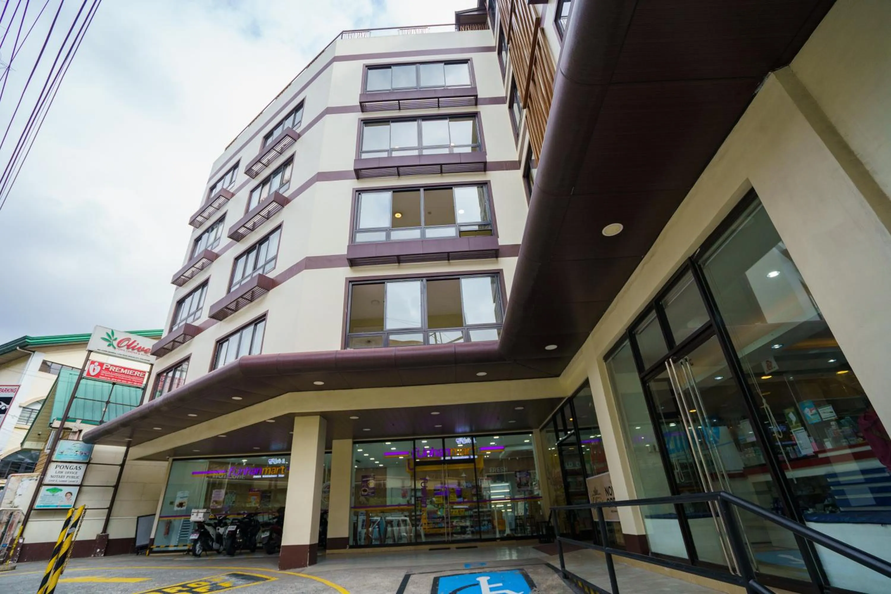 Property building in Olive Town Center and Hotel