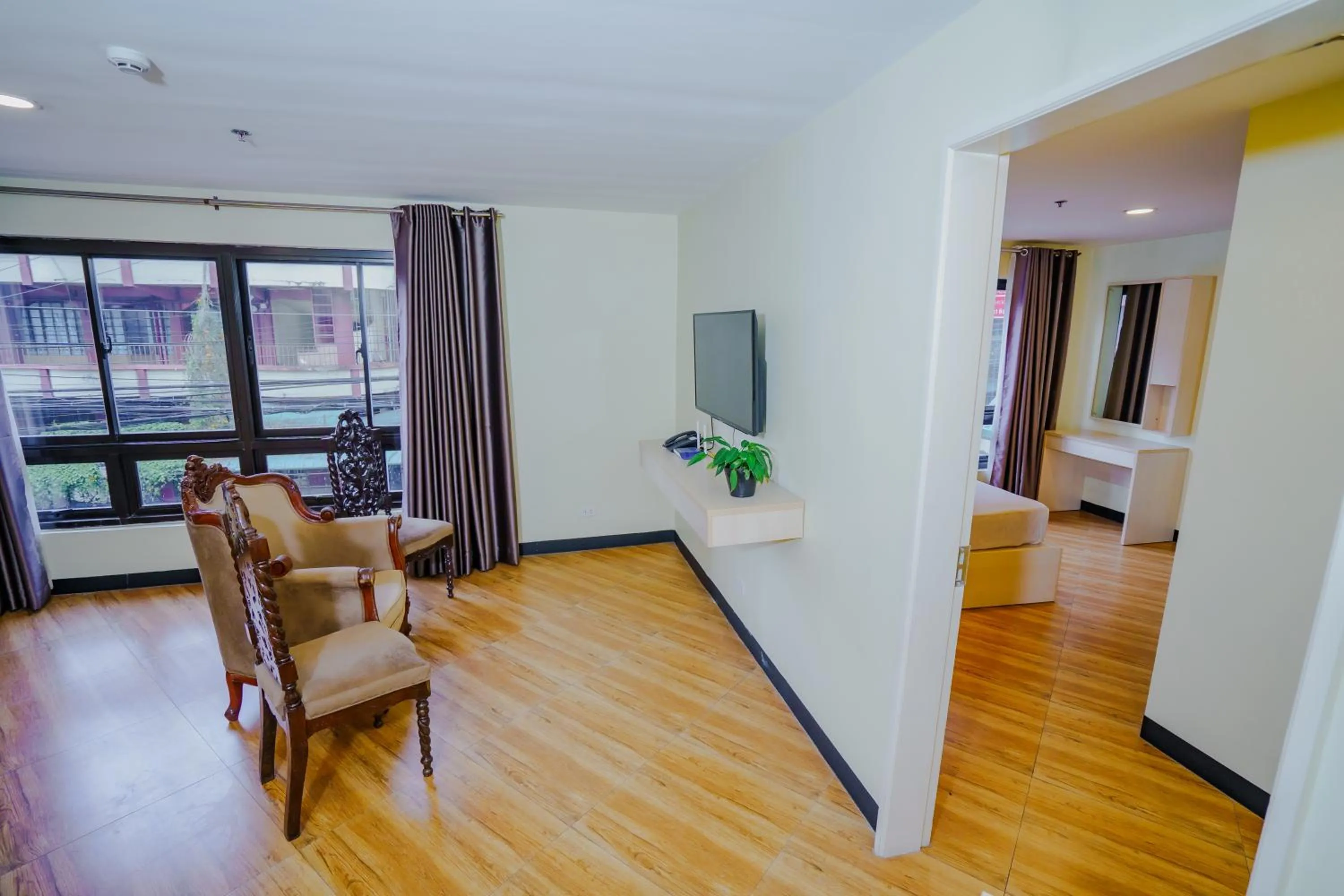 Living room in Olive Town Center and Hotel