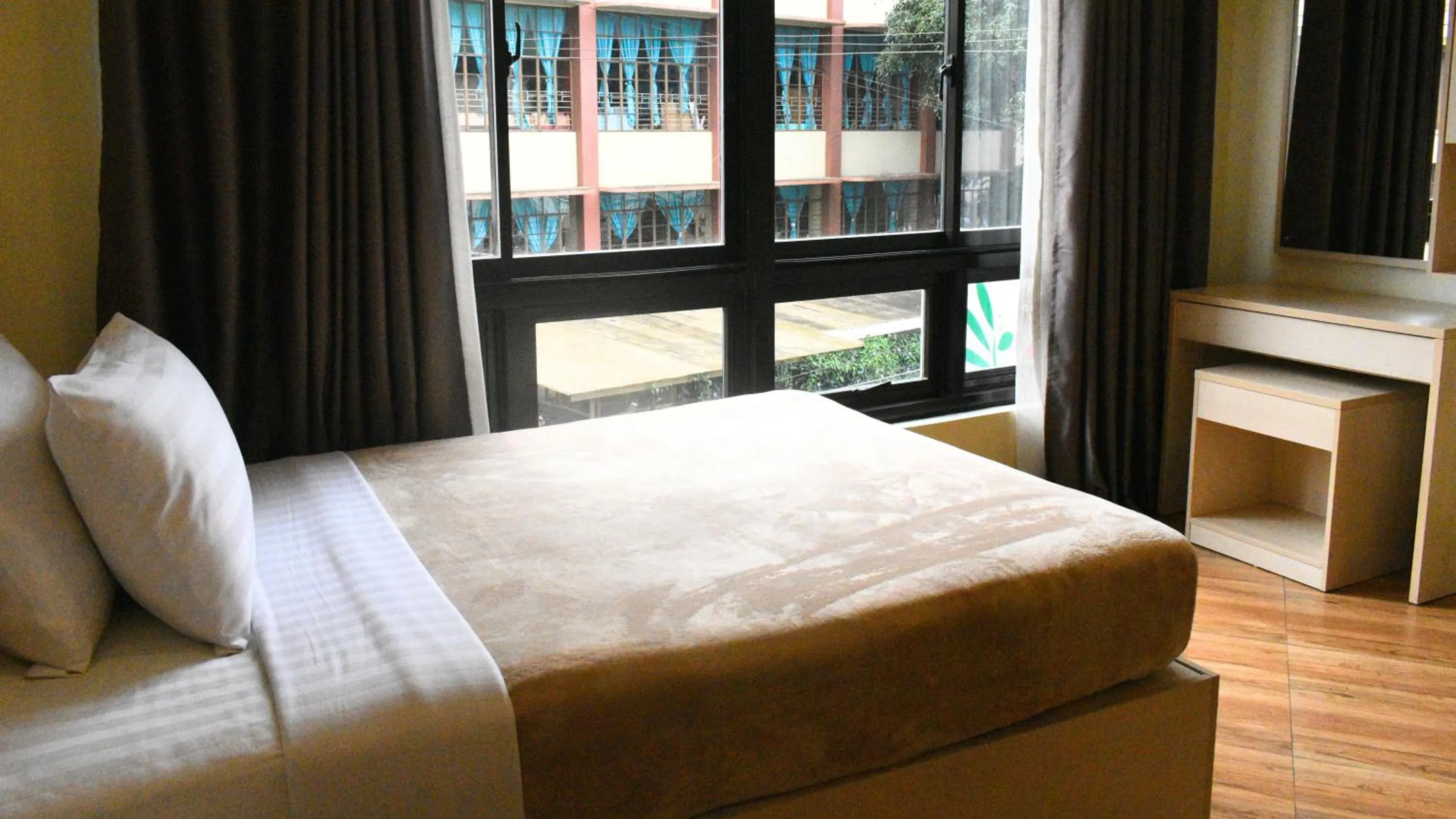 Bed in Olive Town Center and Hotel