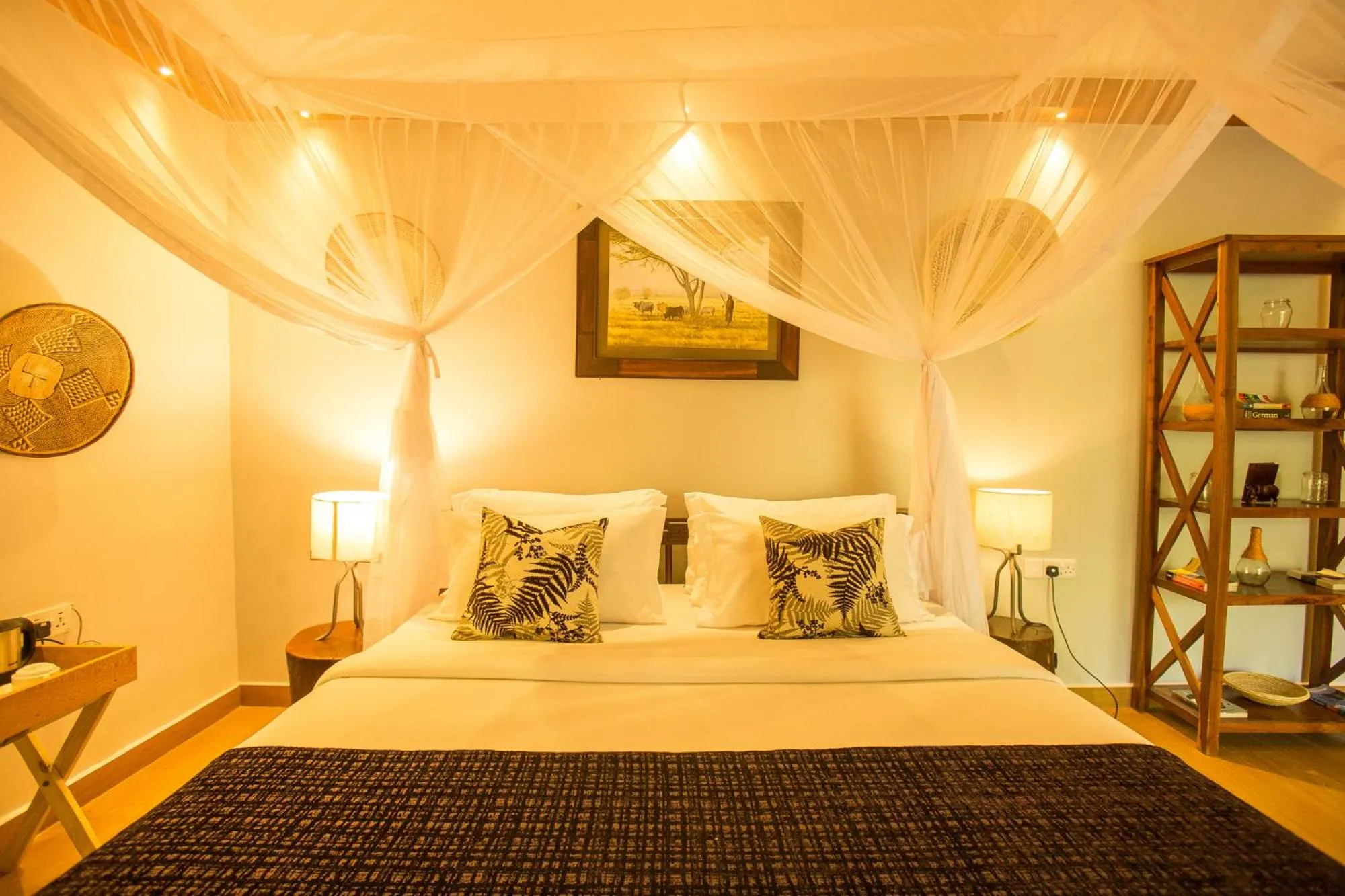 Bed in Amani Safari Lodge and Restaurant