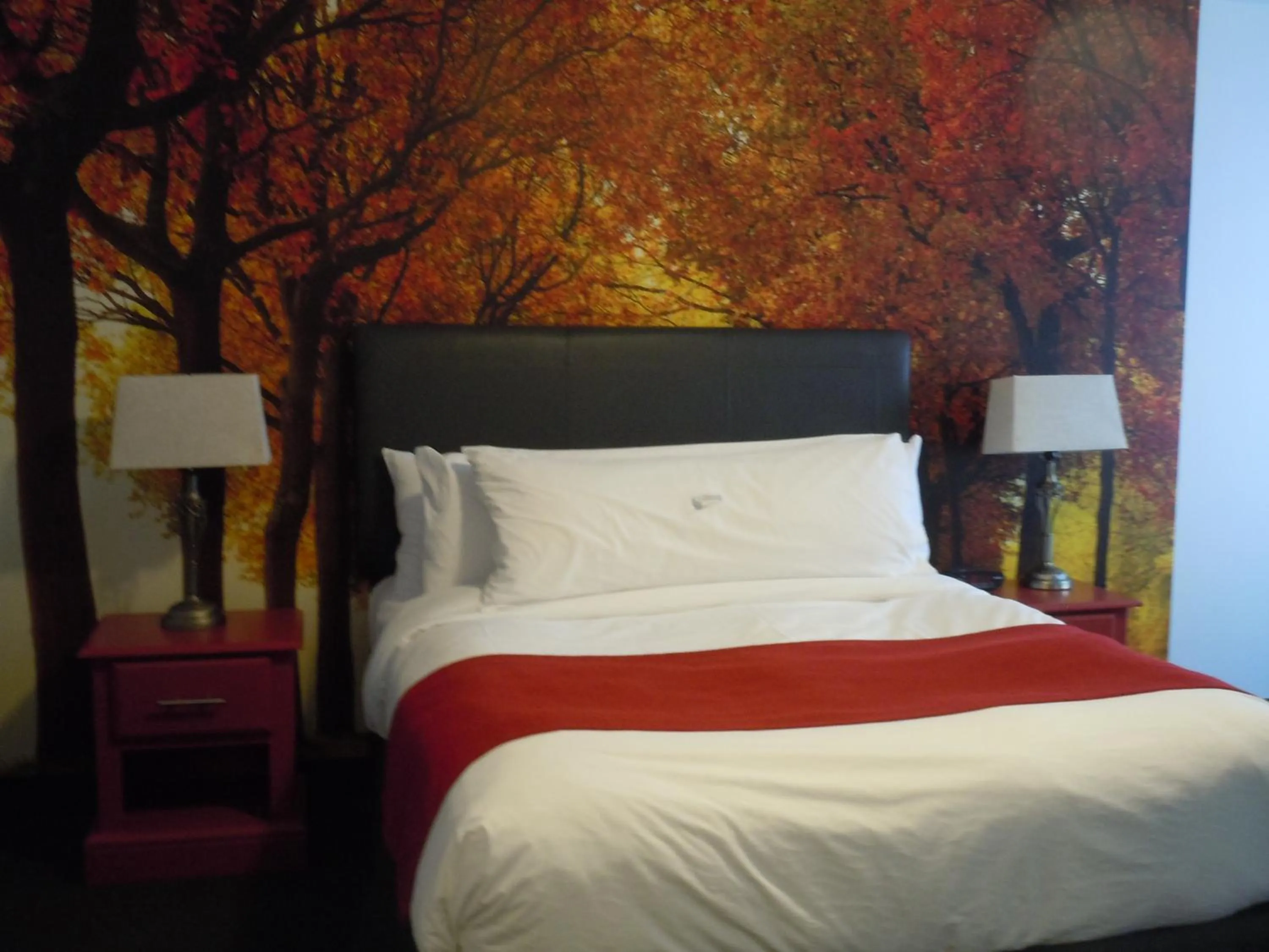 Bed in L'Auberge Du Lac St-Pierre