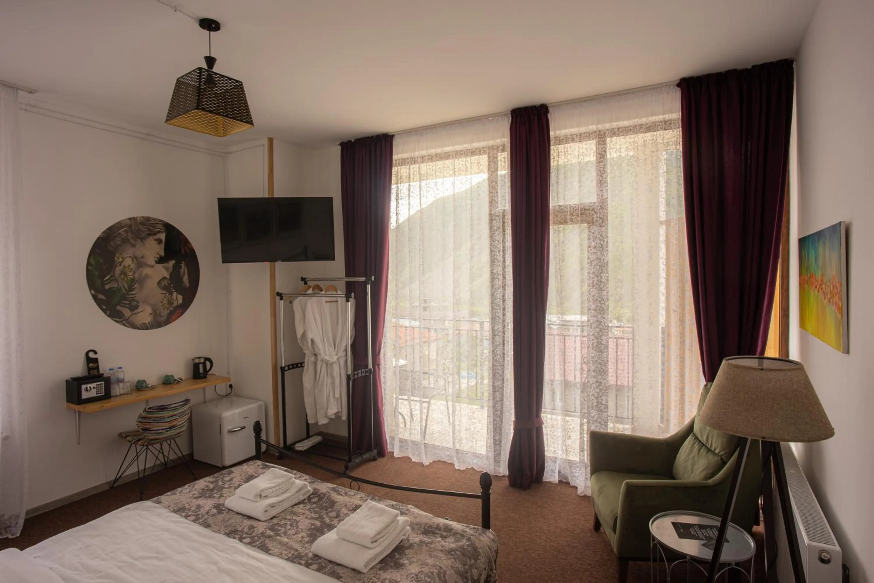 Bed in Mood Hotel Kazbegi