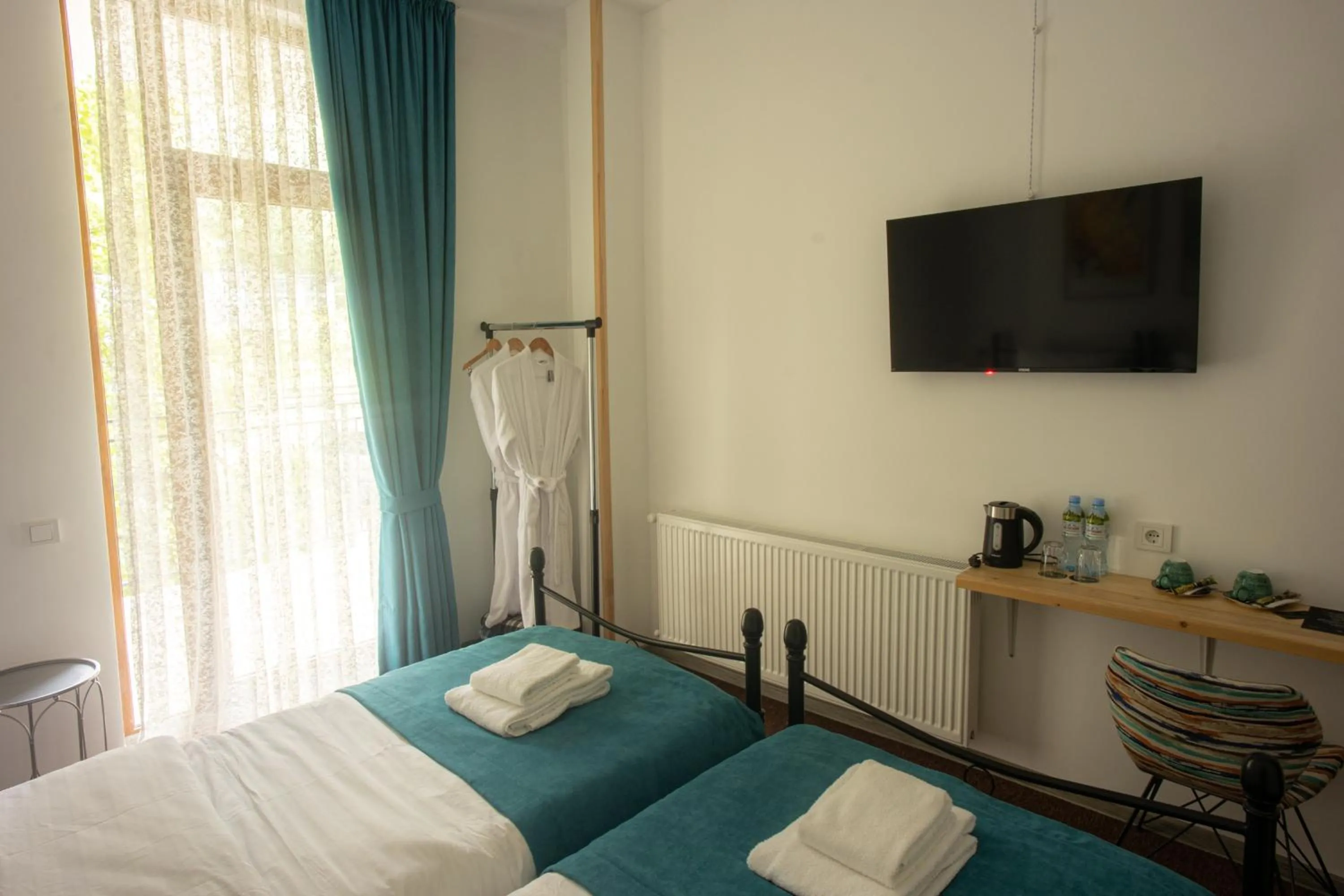 Bed in Mood Hotel Kazbegi