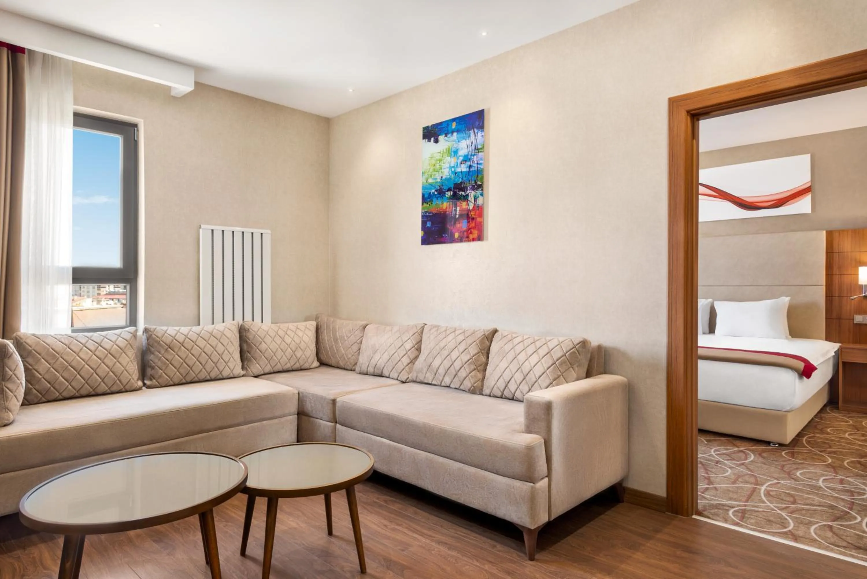 Living room, Bed in Ramada By Wyndham Elbistan