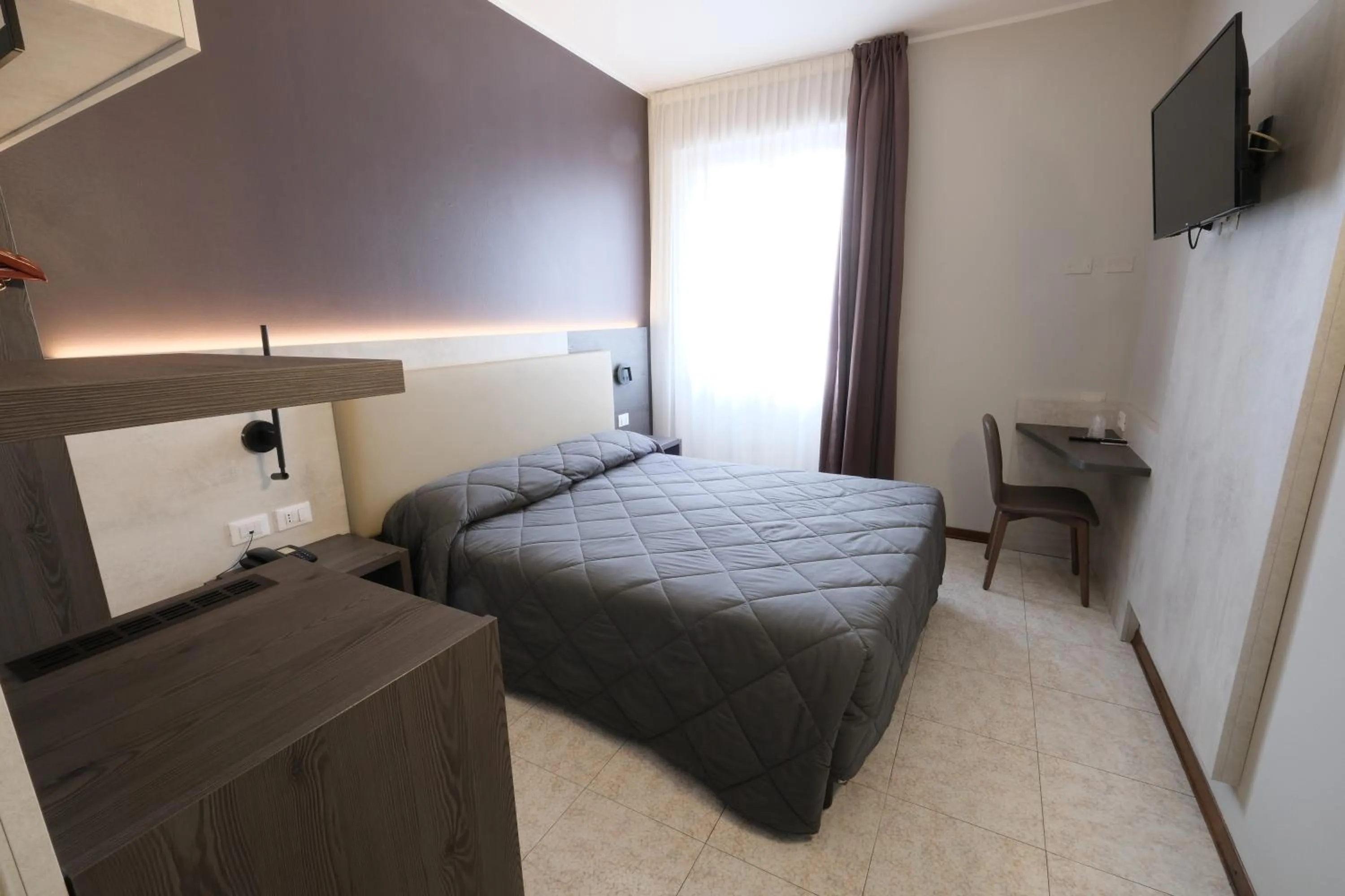 Bed in Hotel Mistral