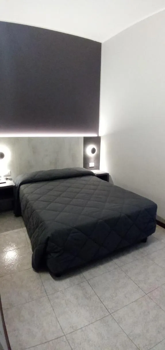 Bed in Hotel Mistral