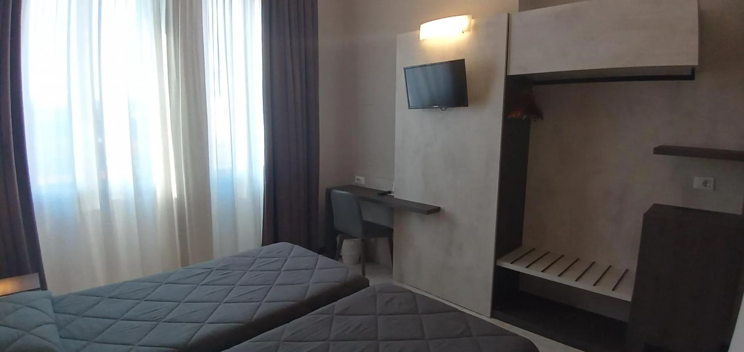 Bed in Hotel Mistral