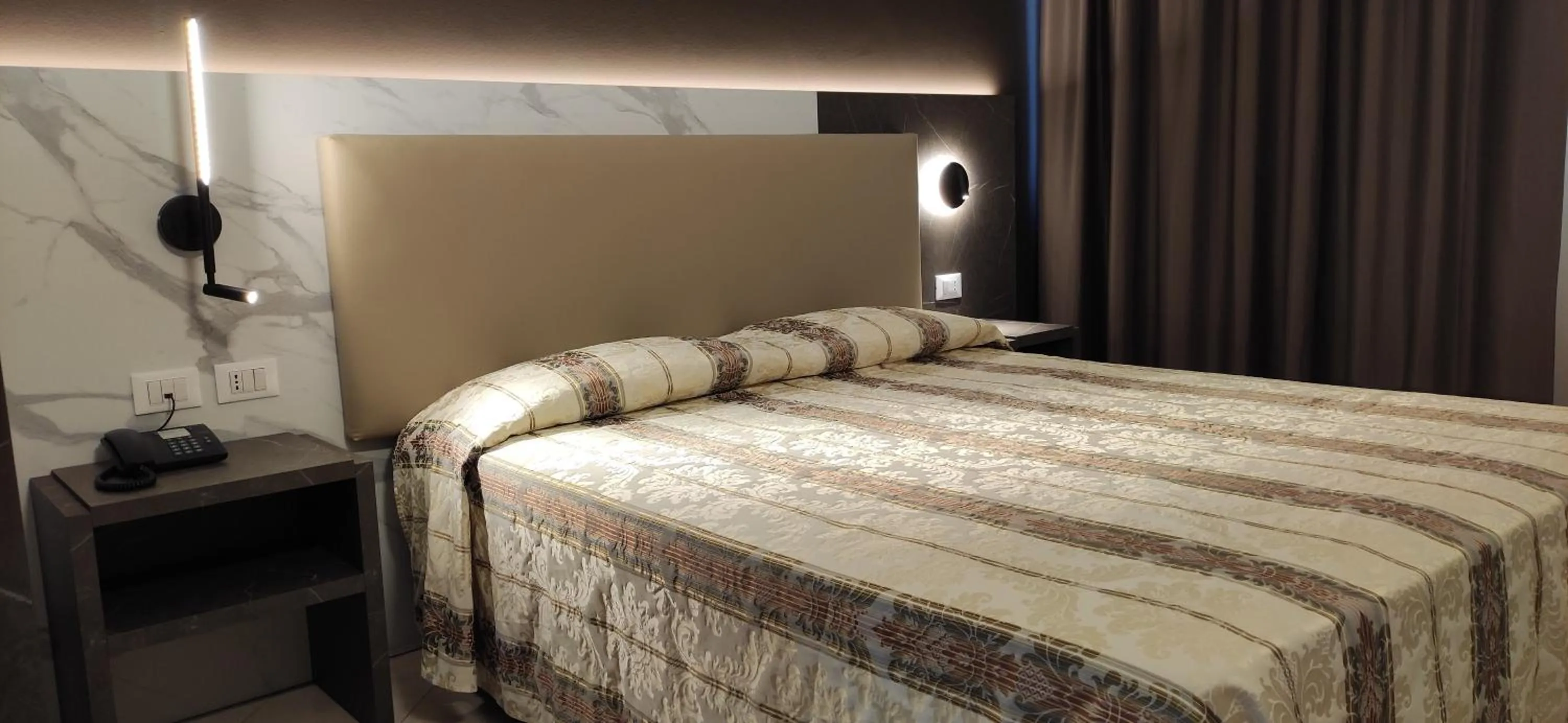 Bed in Hotel Mistral