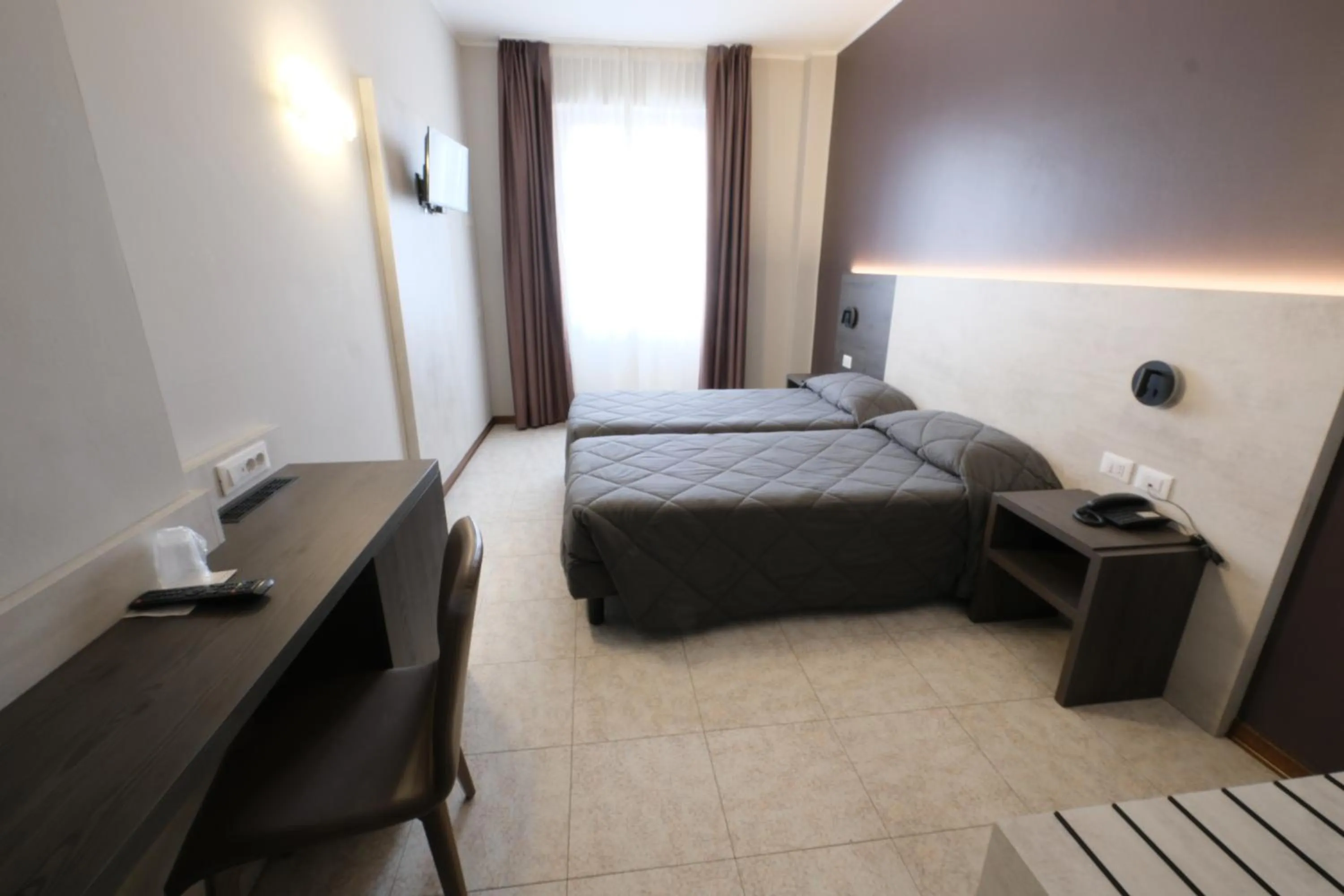 Bed in Hotel Mistral