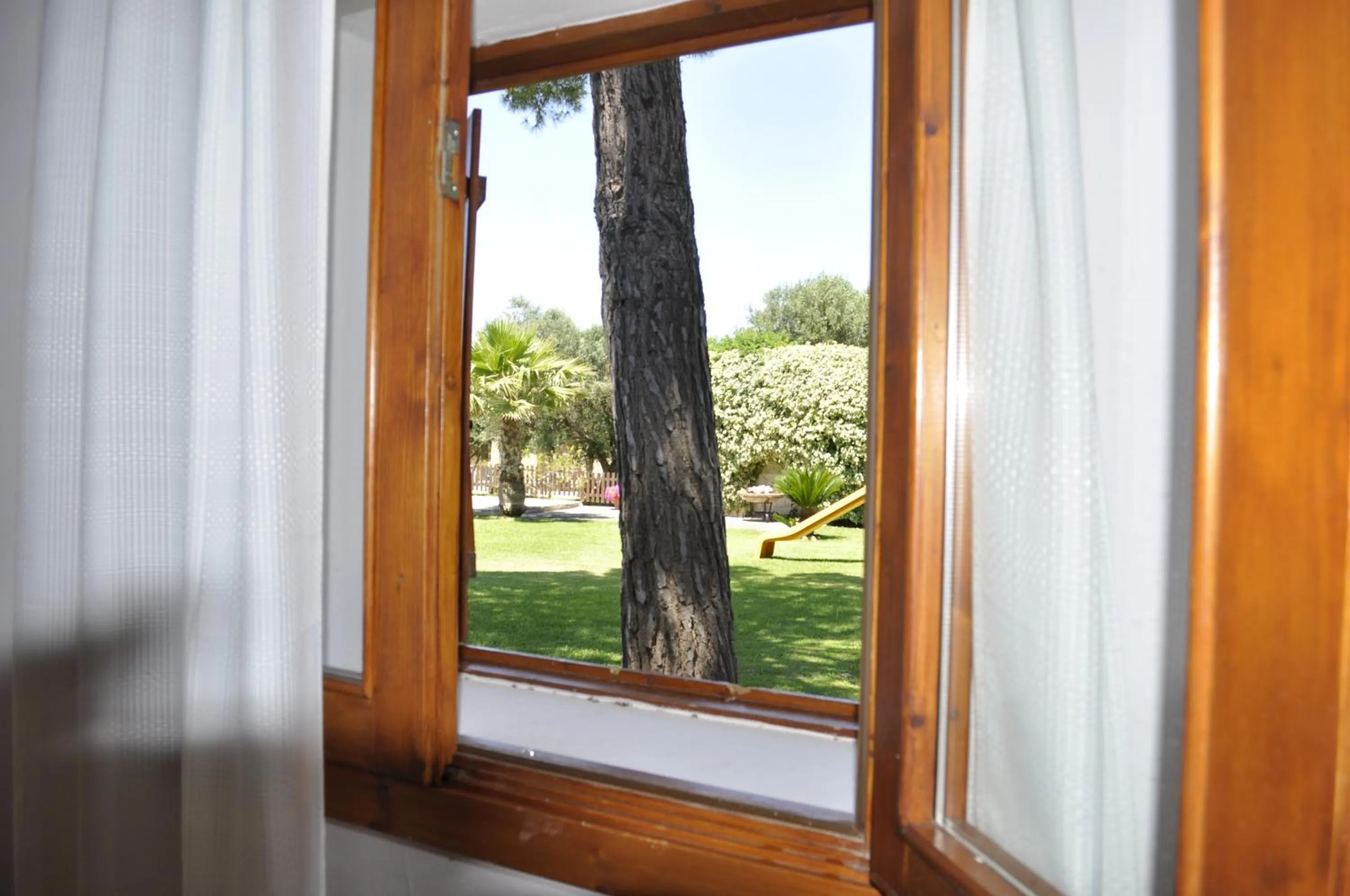 Garden view in RELAIS MASSERIA CASINA DEI CARI