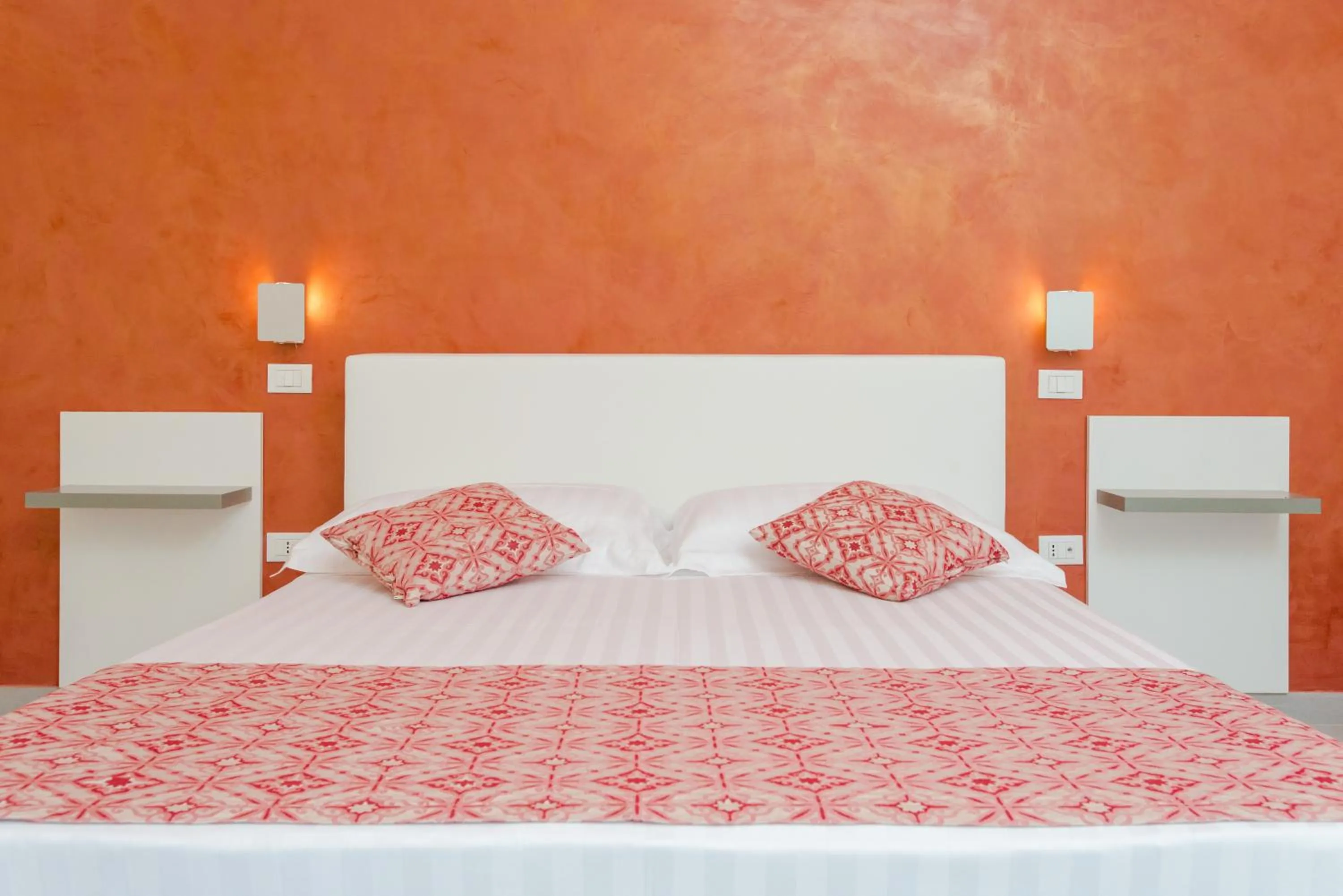 Bed in RELAIS MASSERIA CASINA DEI CARI