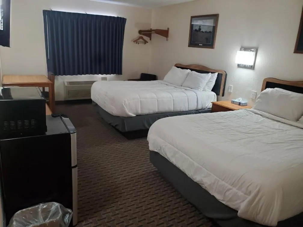 Photo of the whole room, Bed in Hibbing Inn and Suites