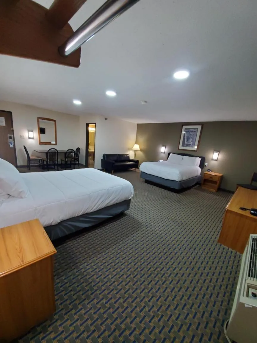 Bed in Hibbing Inn and Suites
