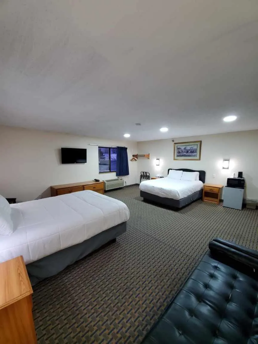 Bed in Hibbing Inn and Suites