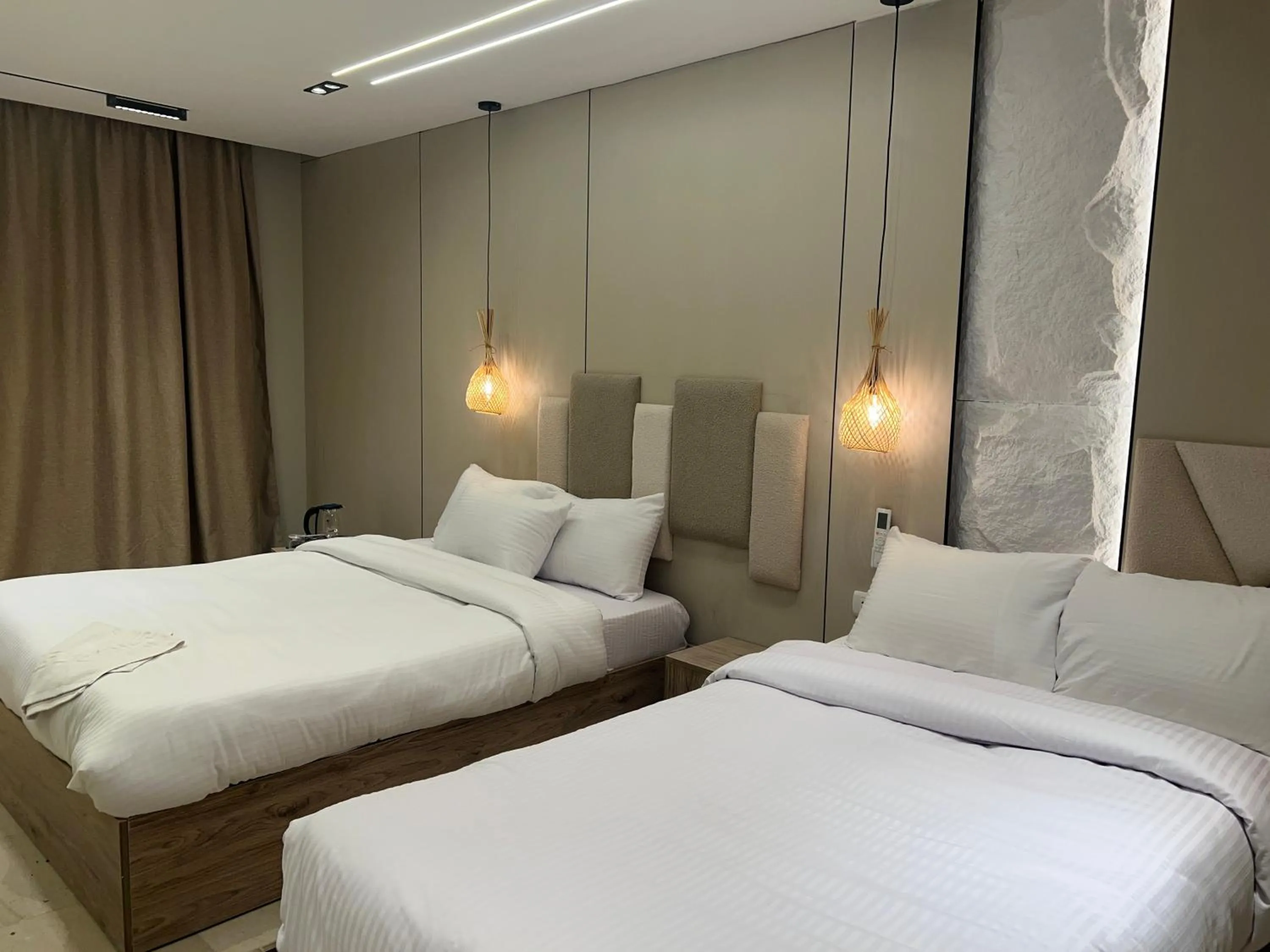 Bed in Pyramids Height Hotel & Pyramids Master Scene Rooftop