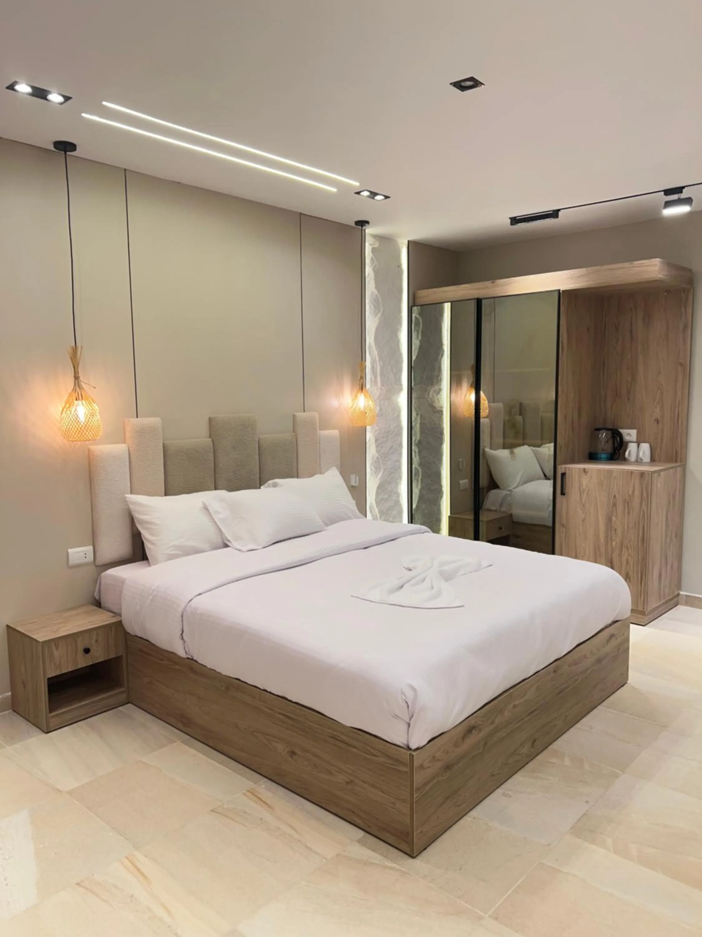 Bed in Pyramids Height Hotel & Pyramids Master Scene Rooftop