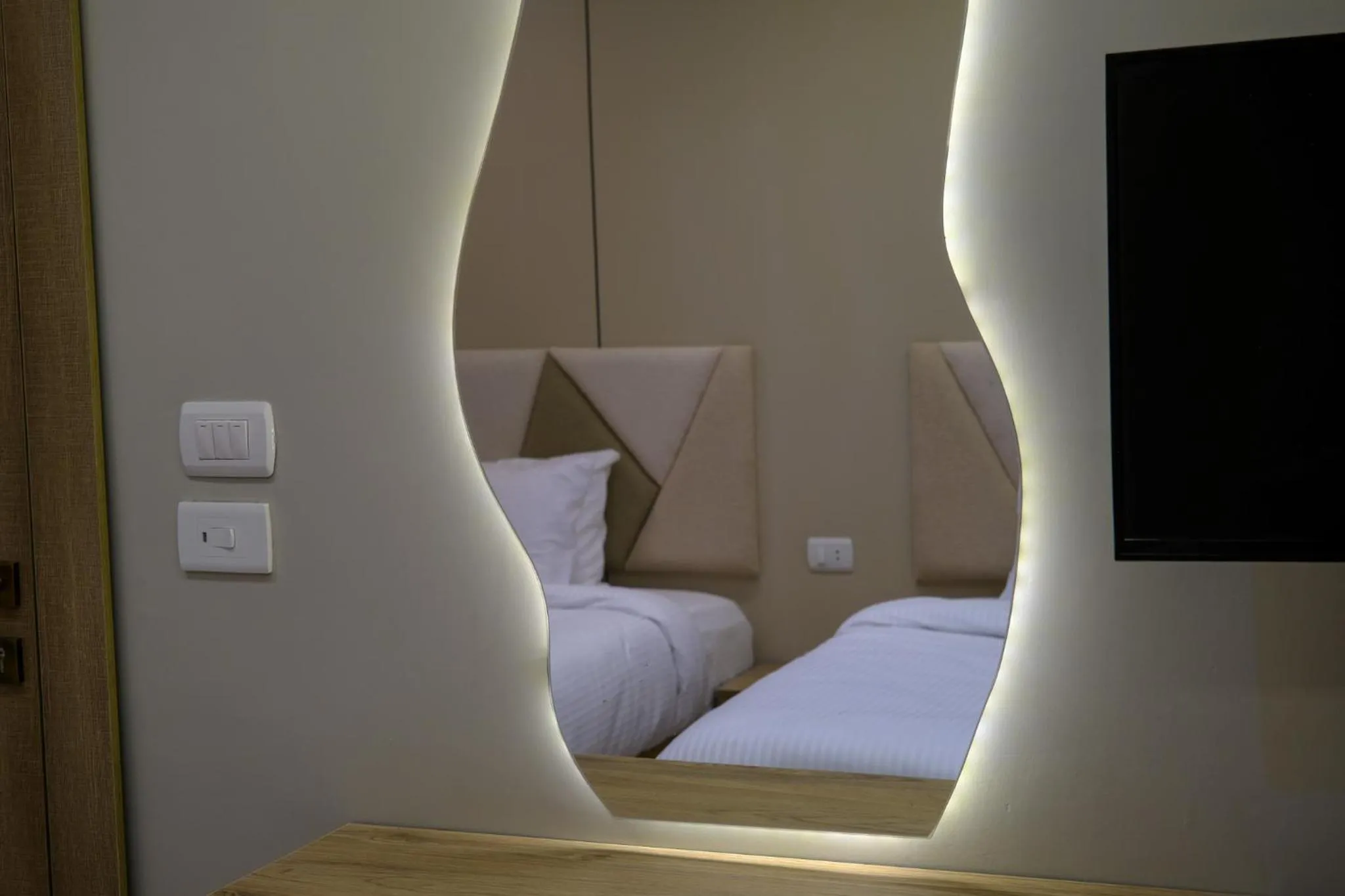 Bed in Pyramids Height Hotel & Pyramids Master Scene Rooftop