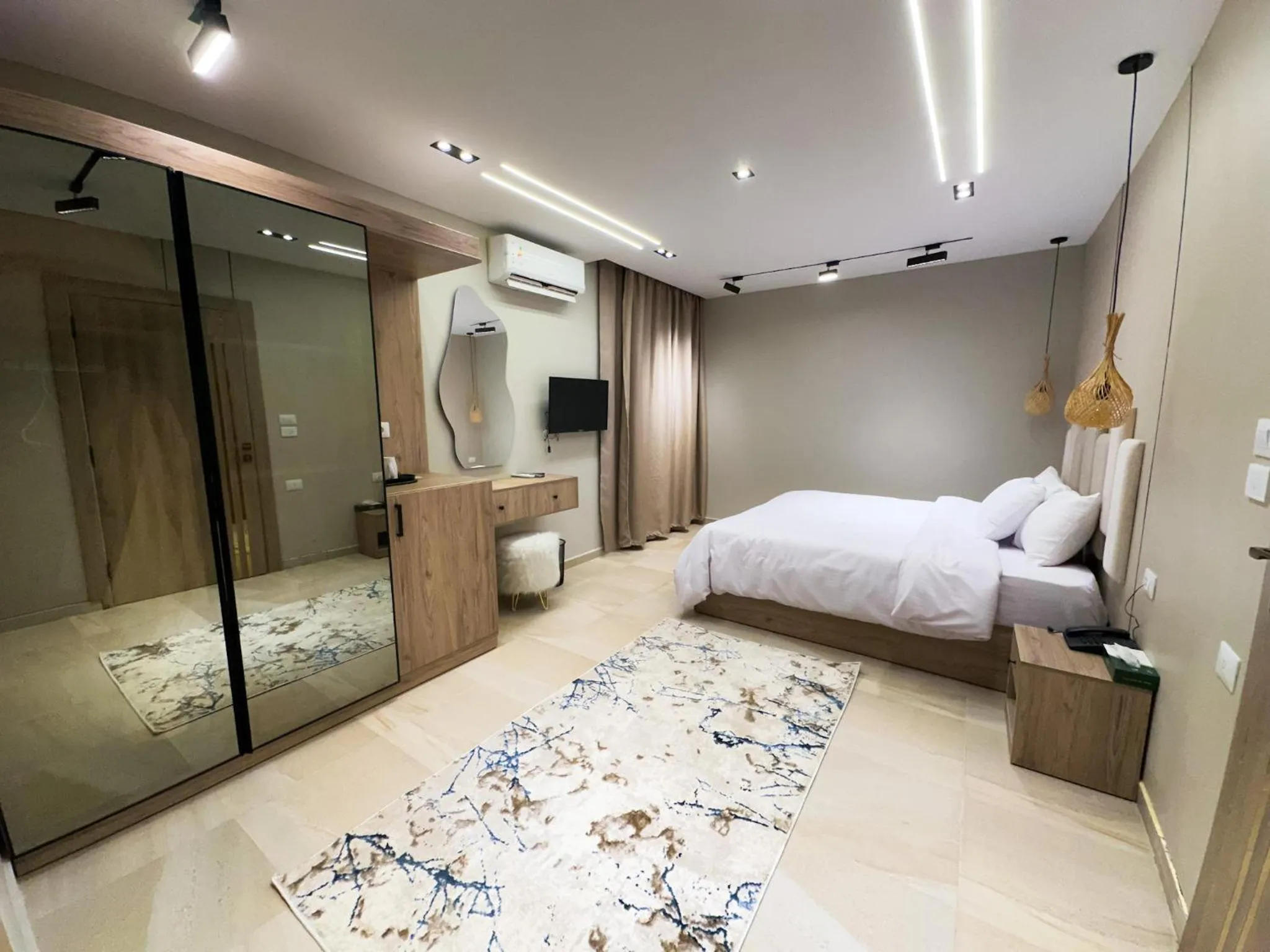 Bed in Pyramids Height Hotel & Pyramids Master Scene Rooftop