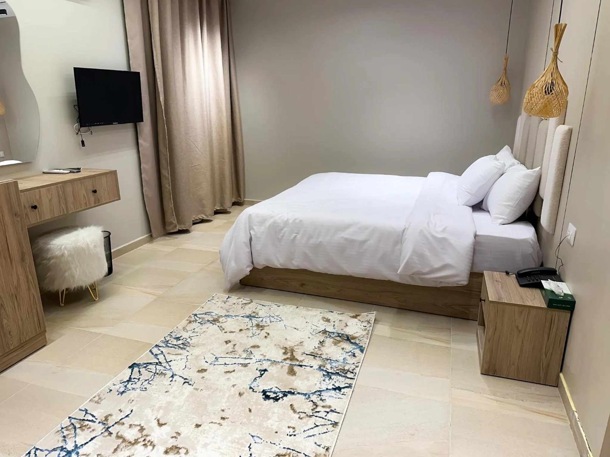 Bed in Pyramids Height Hotel & Pyramids Master Scene Rooftop