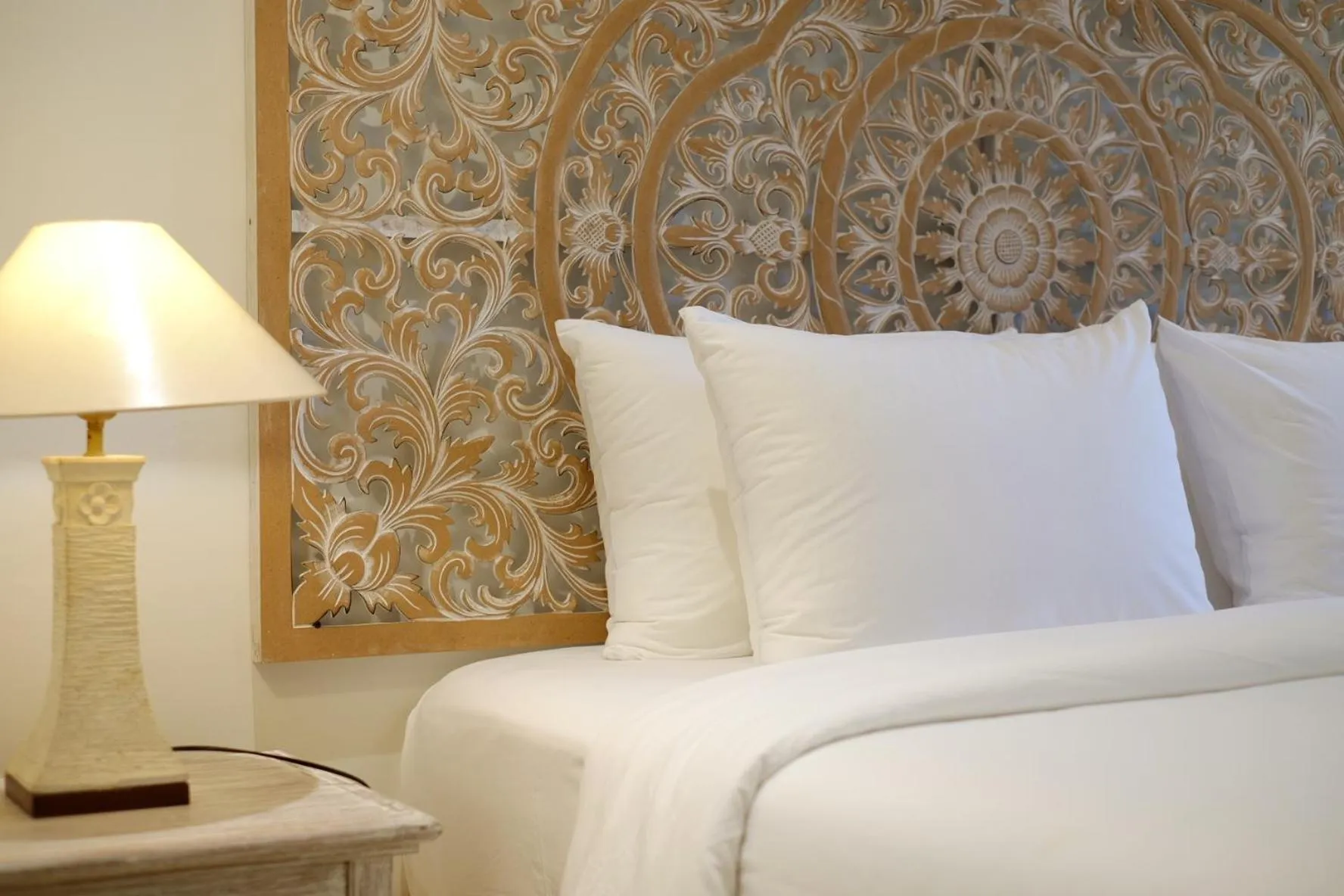 Bed in Su's Cottages Legian