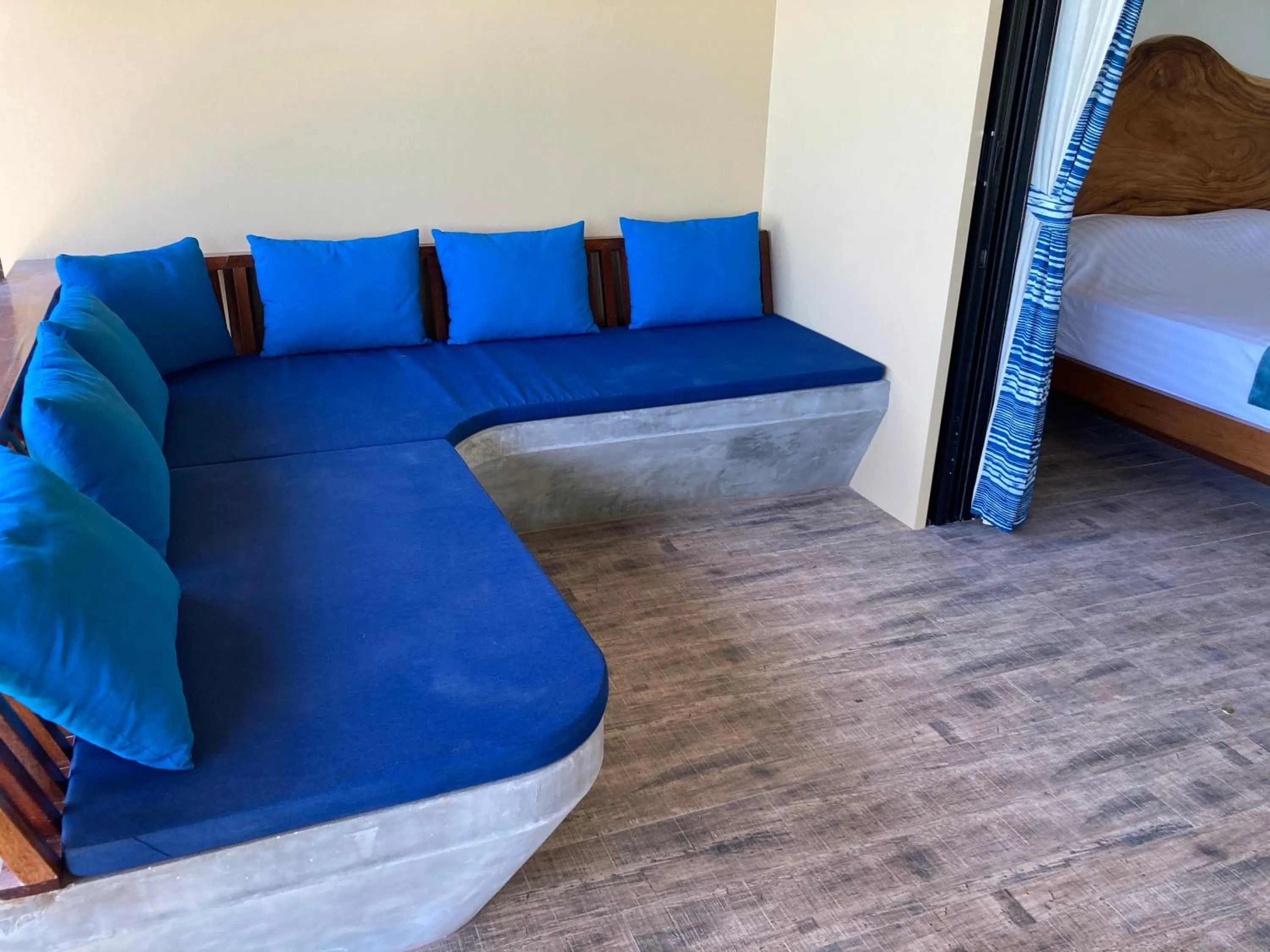 Seating area, Bed in Absolute Beachfront Villas