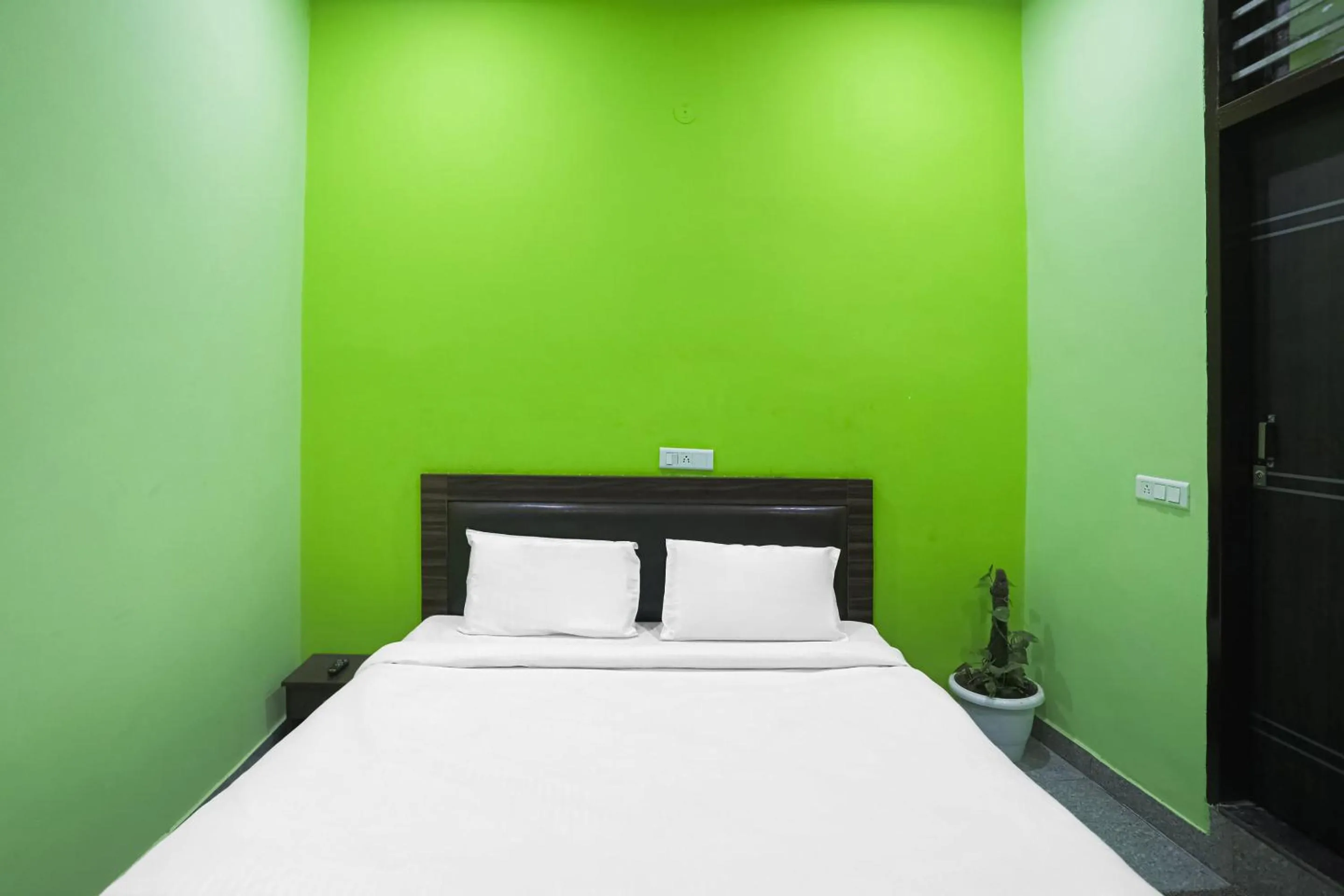 Bedroom in Capital O A-one