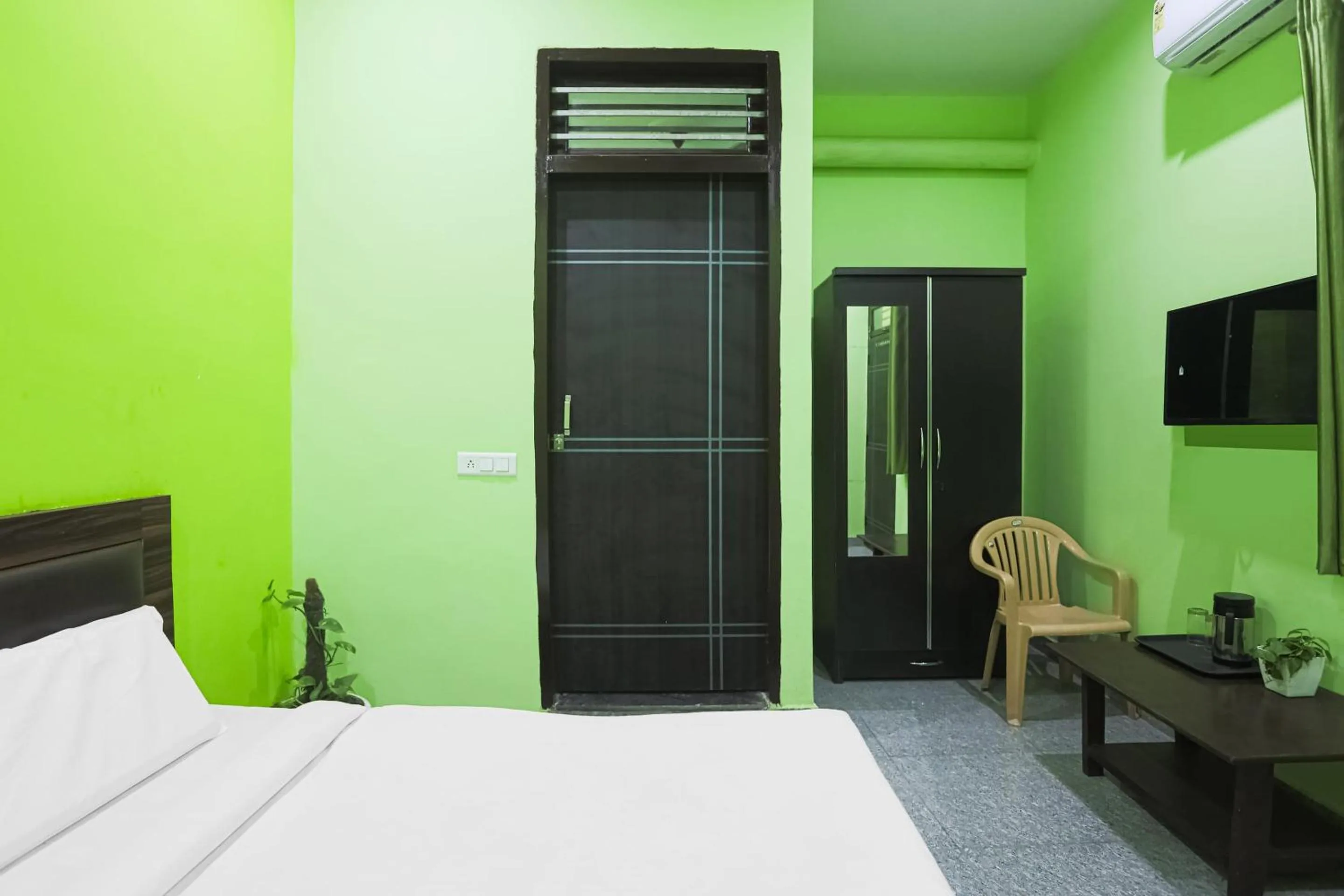 Bedroom in Capital O A-one