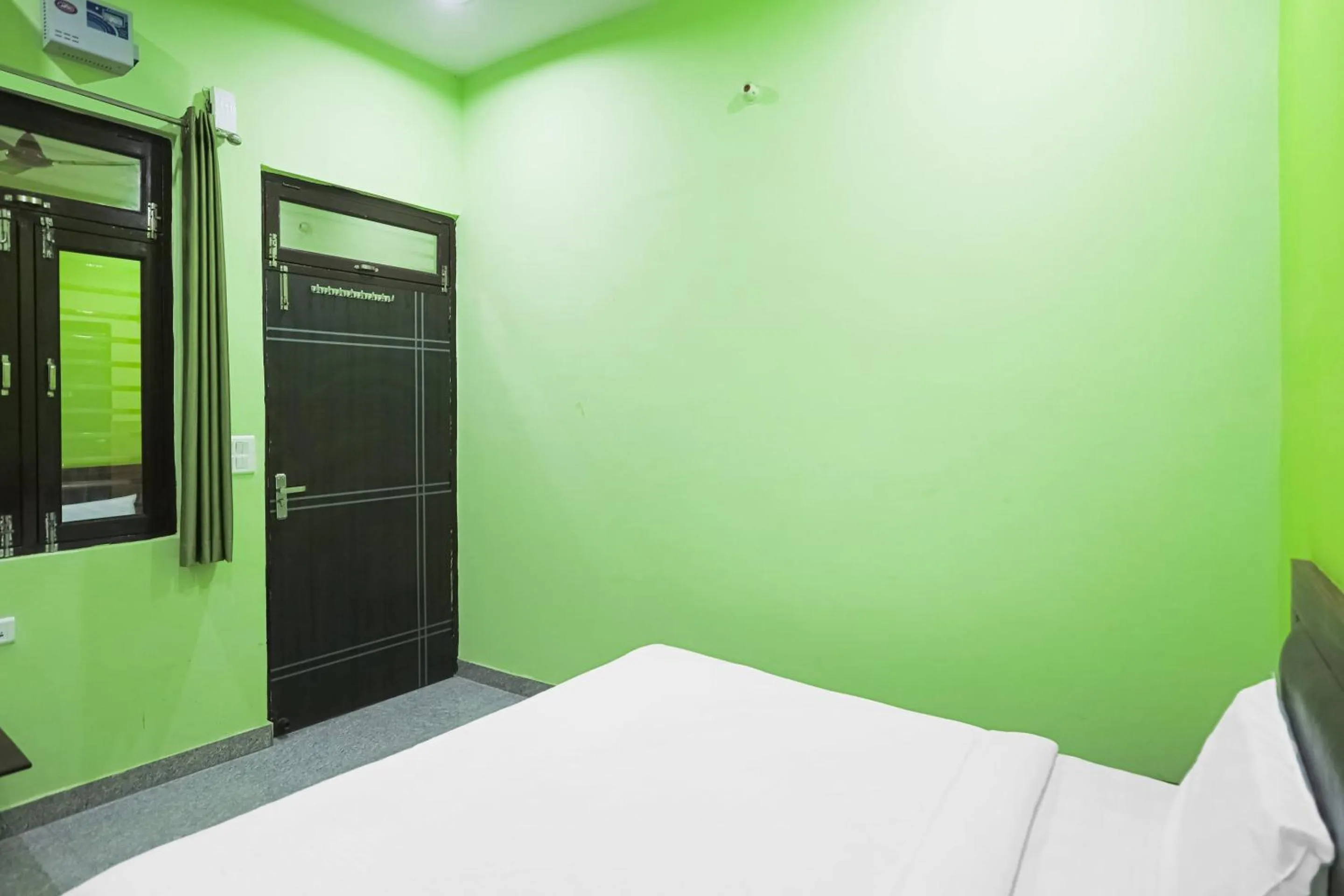 Bedroom in Capital O A-one