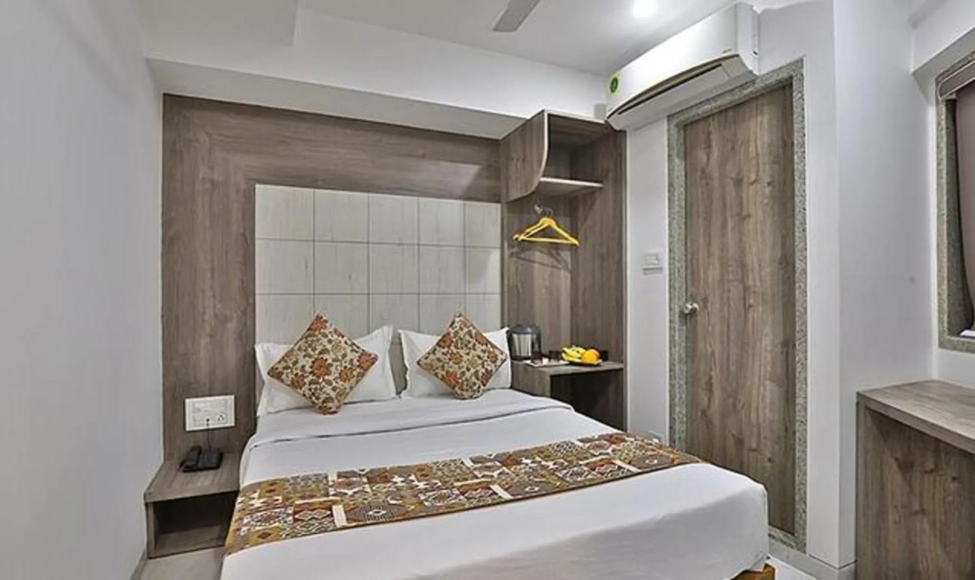 Bed in FabHotel Prime Legend