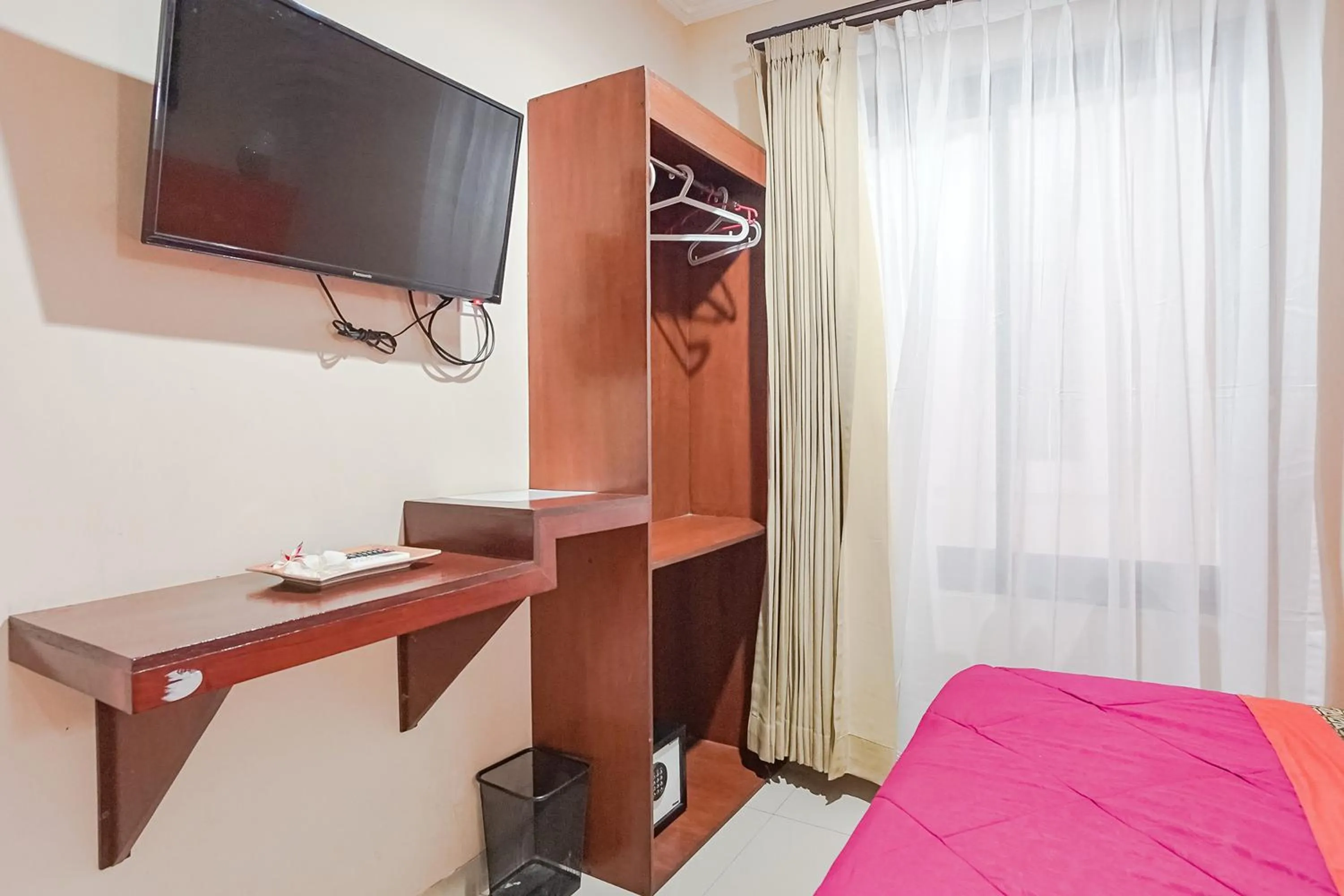 TV and multimedia, Bed in Taxa Uma Guest House