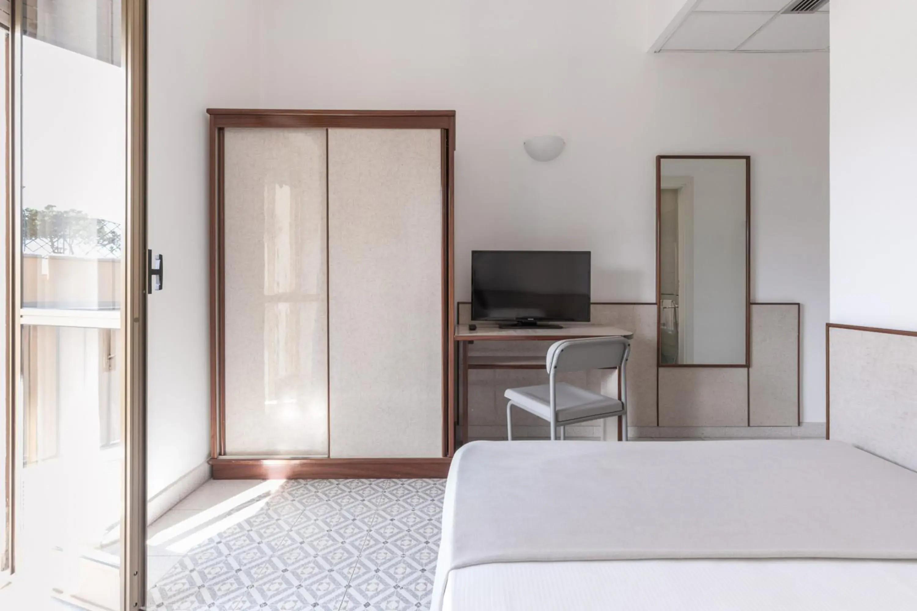 Bed in Hotel Serapo Bed in Hotel Serapo