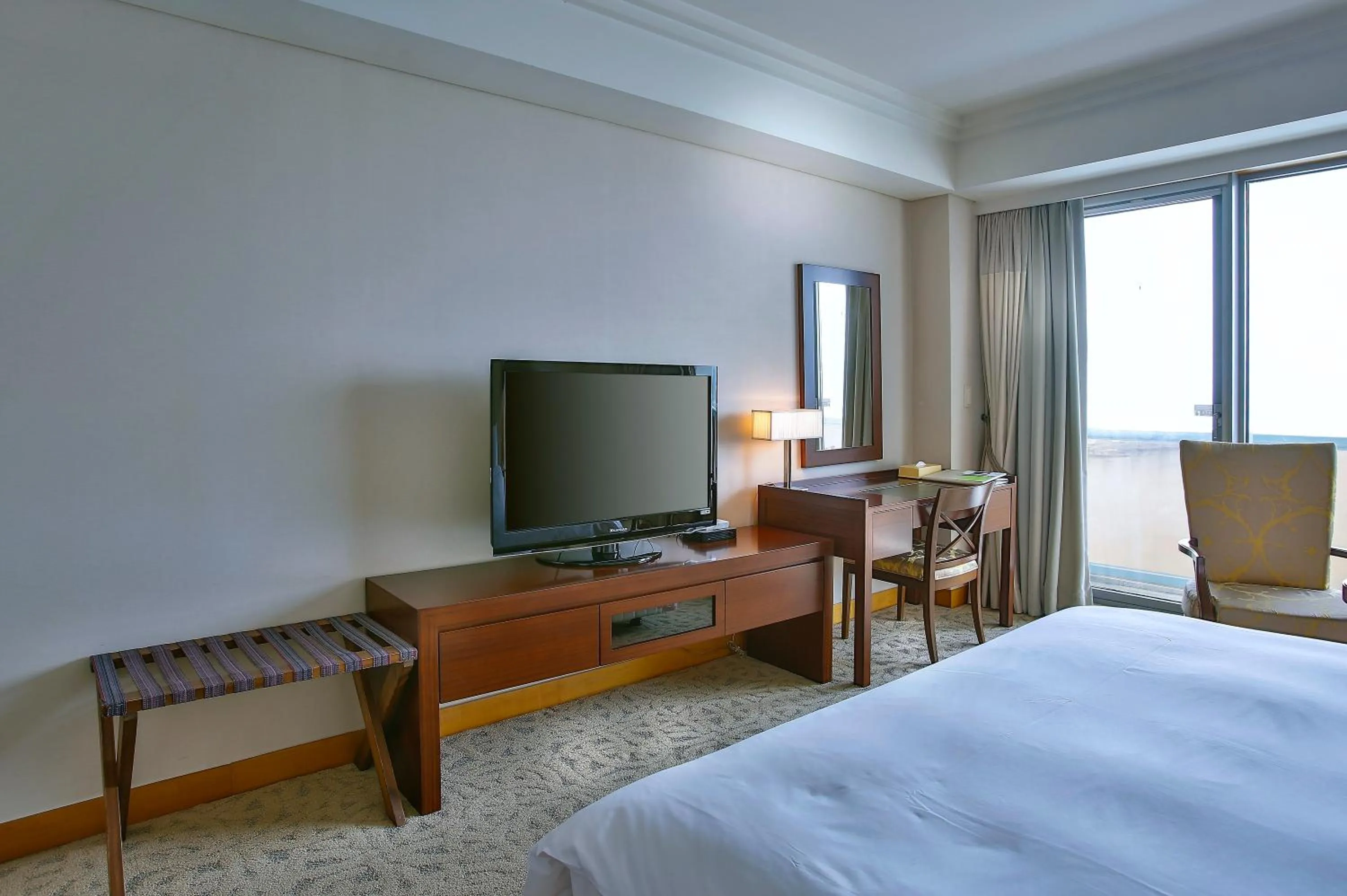 hair dresser, Bed in Hotel Hyundai by Lahan Mokpo