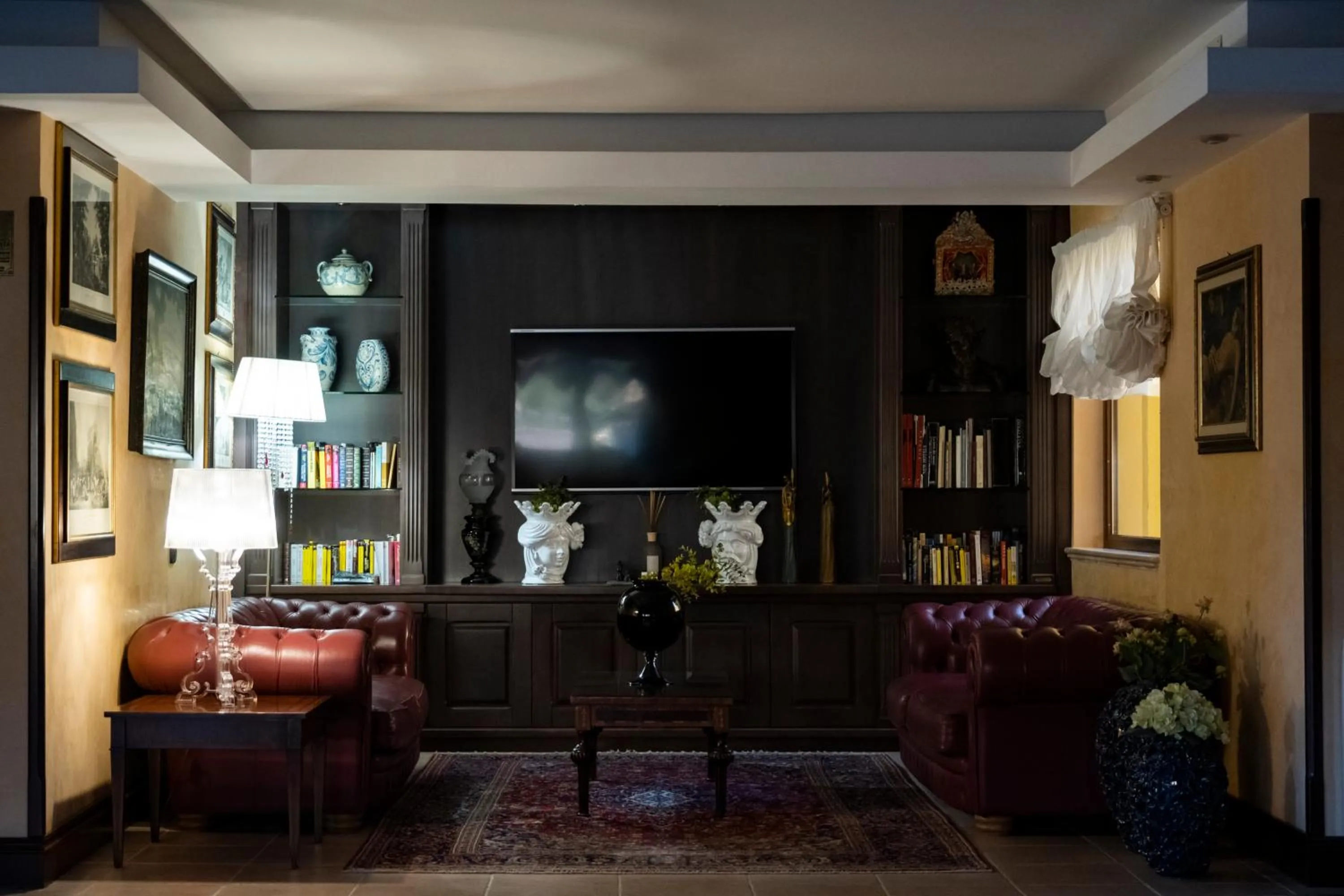 Communal lounge/ TV room in Baia Di Ulisse Wellness & Spa