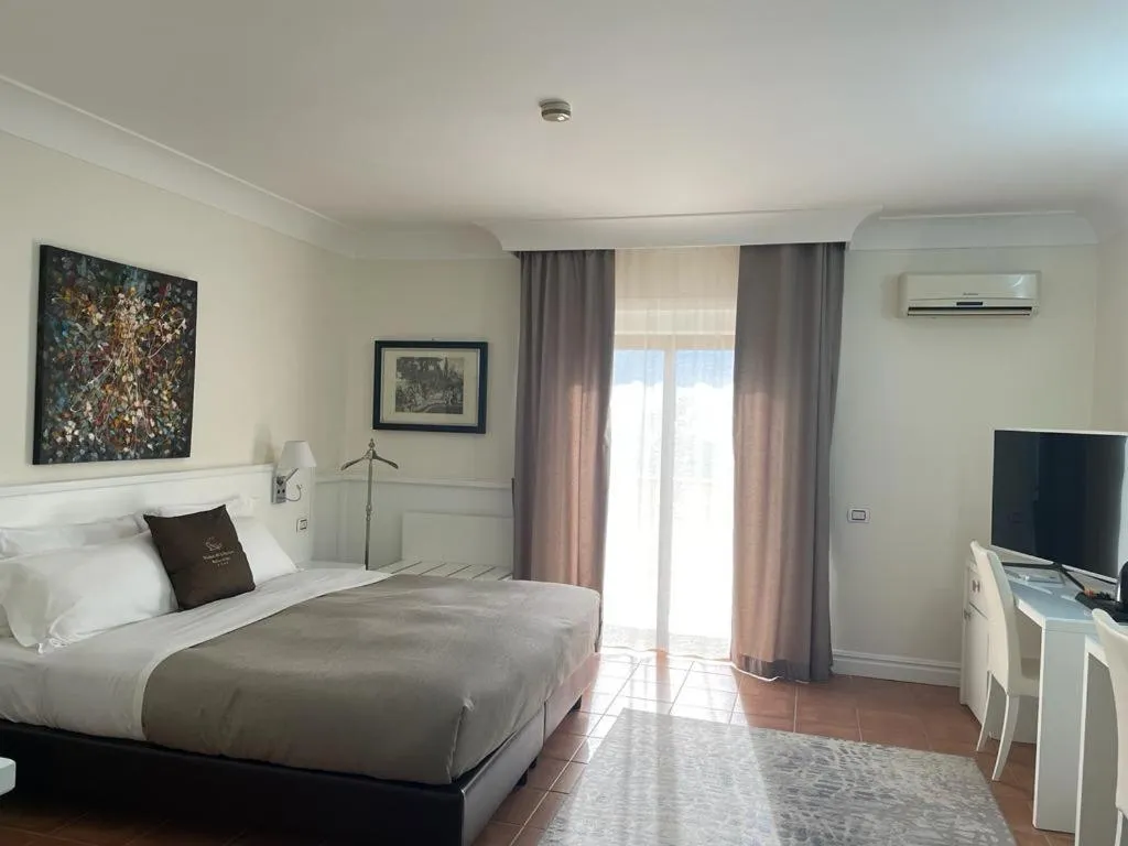 Bed in Baia Di Ulisse Wellness & Spa